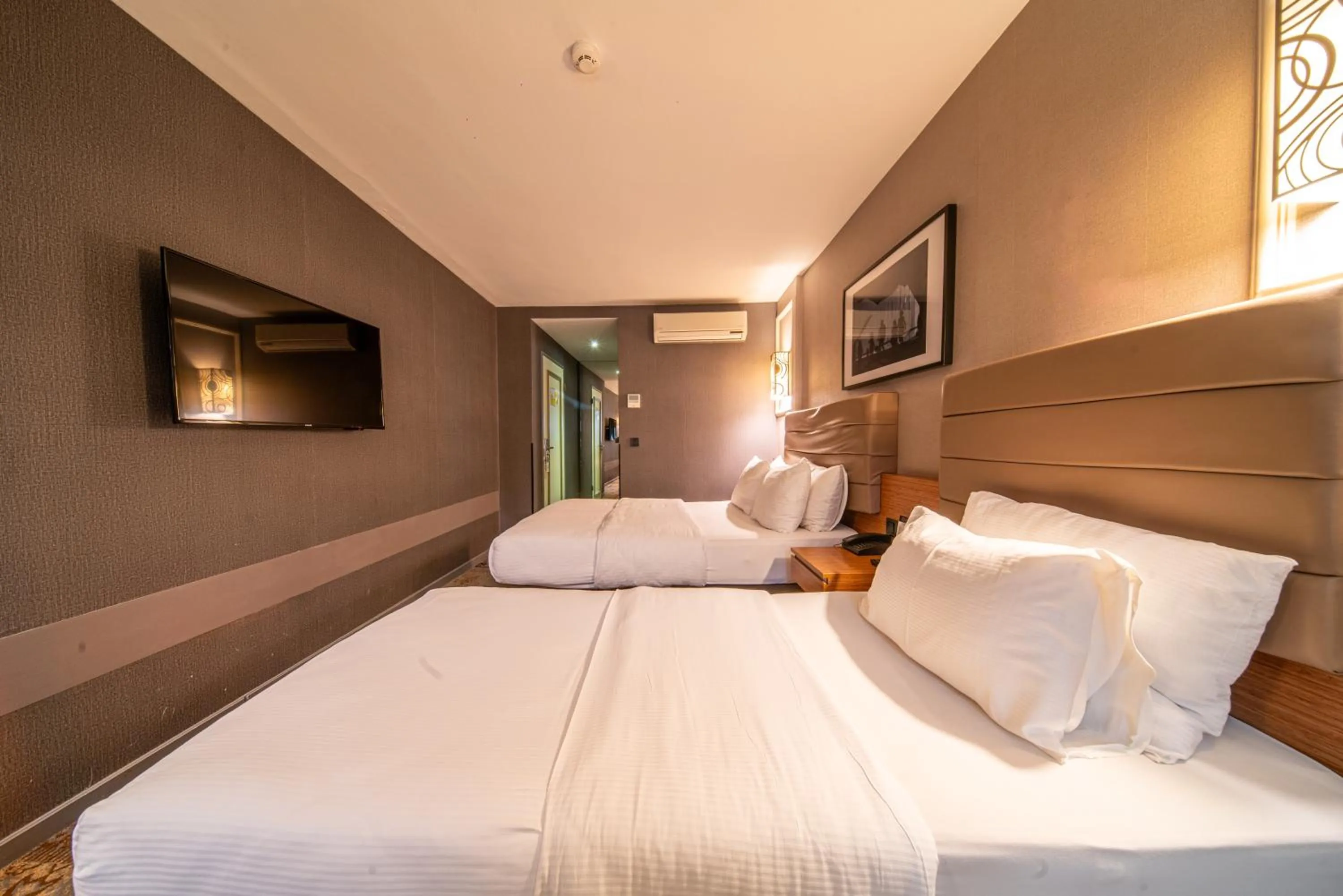 Bed in All Seasons Hotel