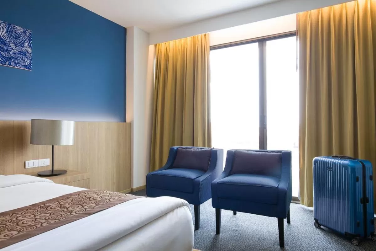 Bed in Royal Palace Hotel