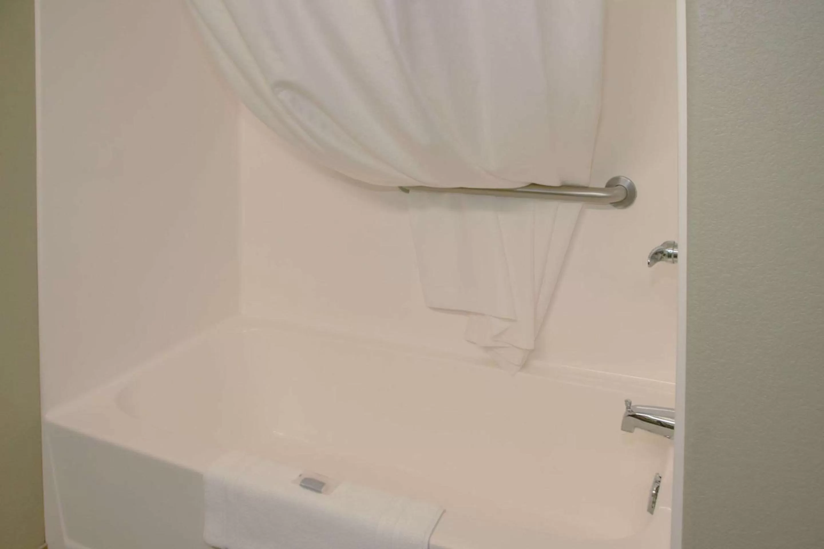 Bedroom in Expressway Suites of Grand Forks