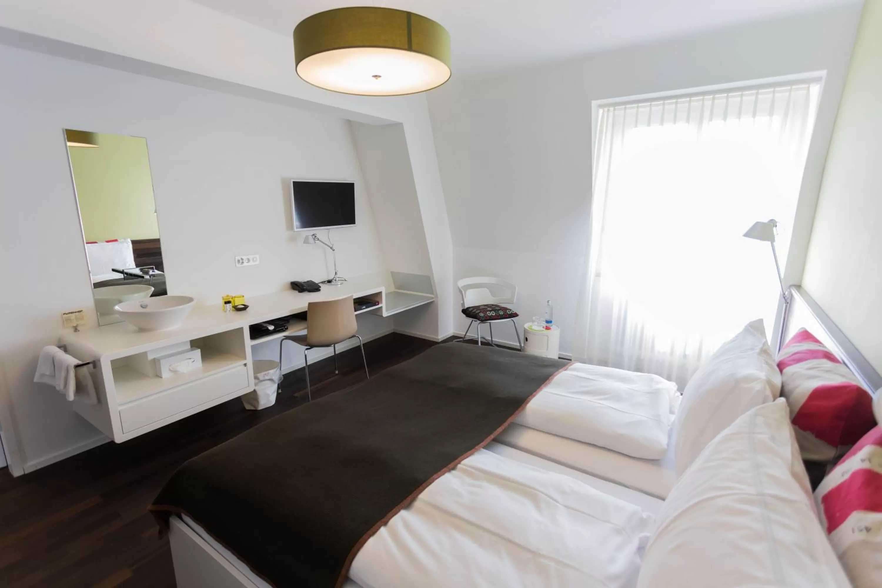 Bed in Design Hotel Plattenhof