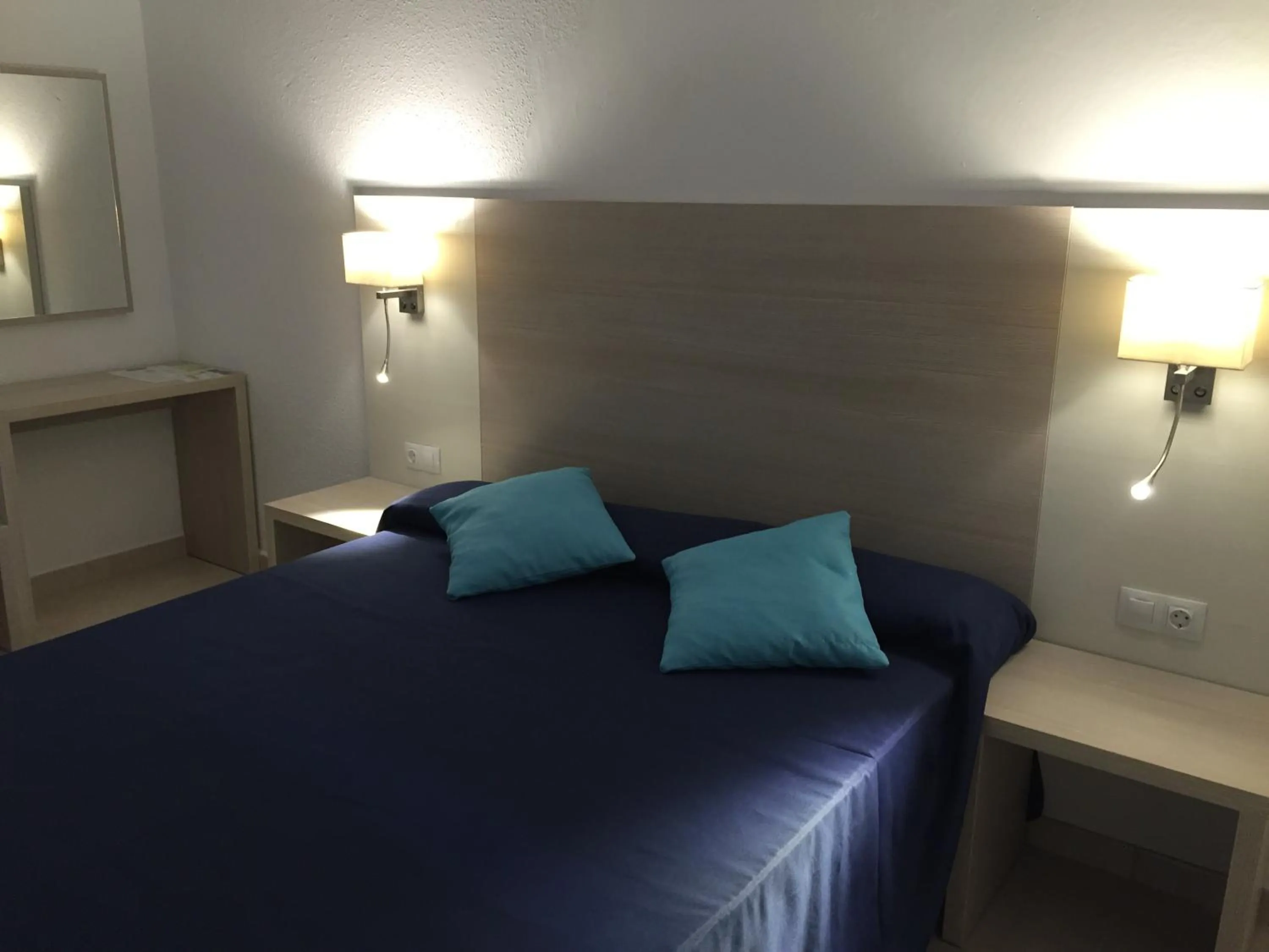 Bed in Hotel Antares