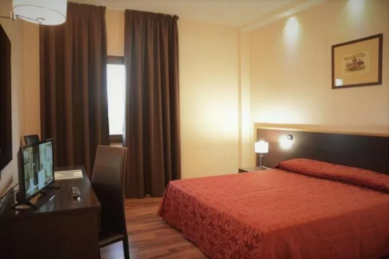 Bed in Forum Palace Hotel