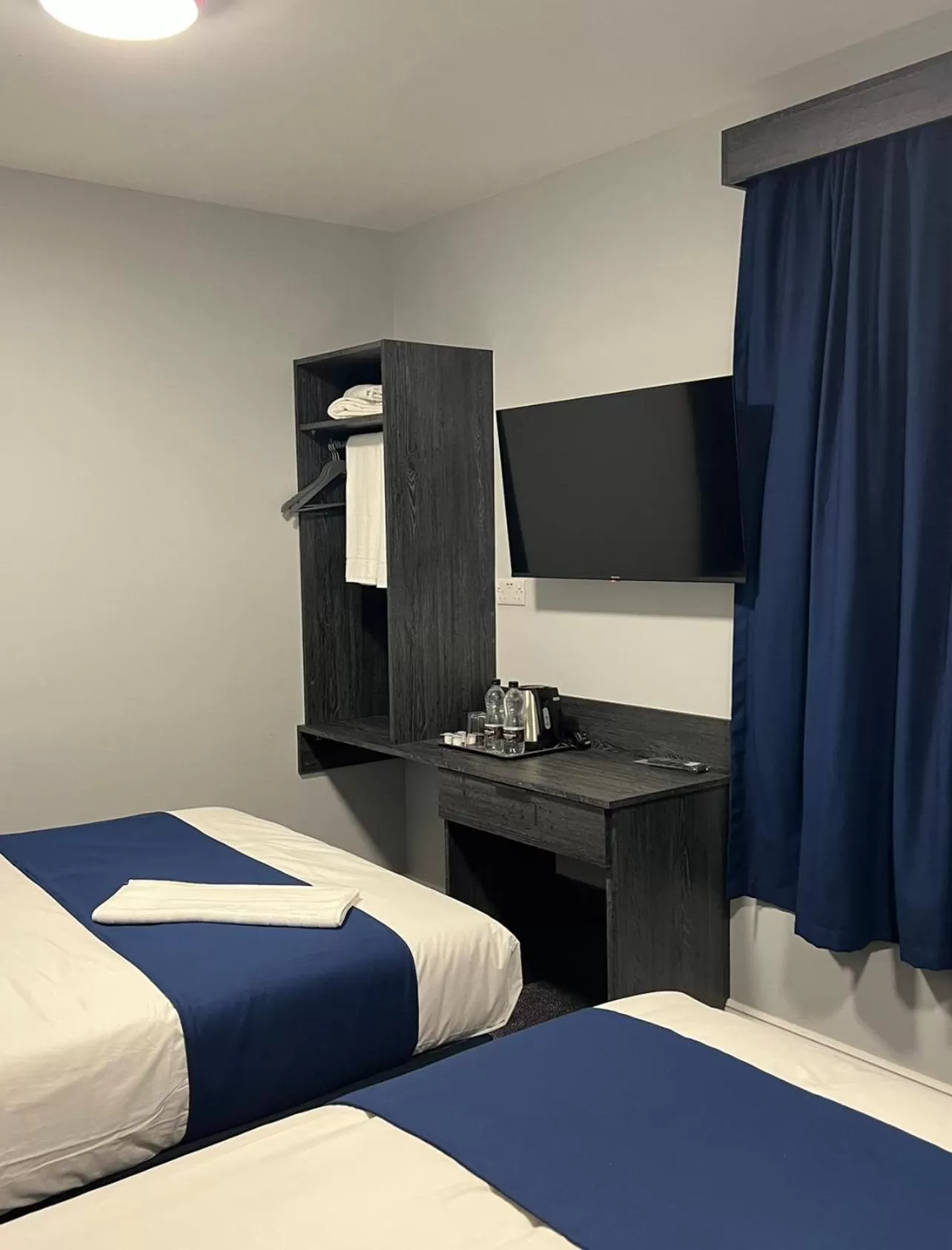 TV and multimedia, Bed in Blue Sapphire Hotel