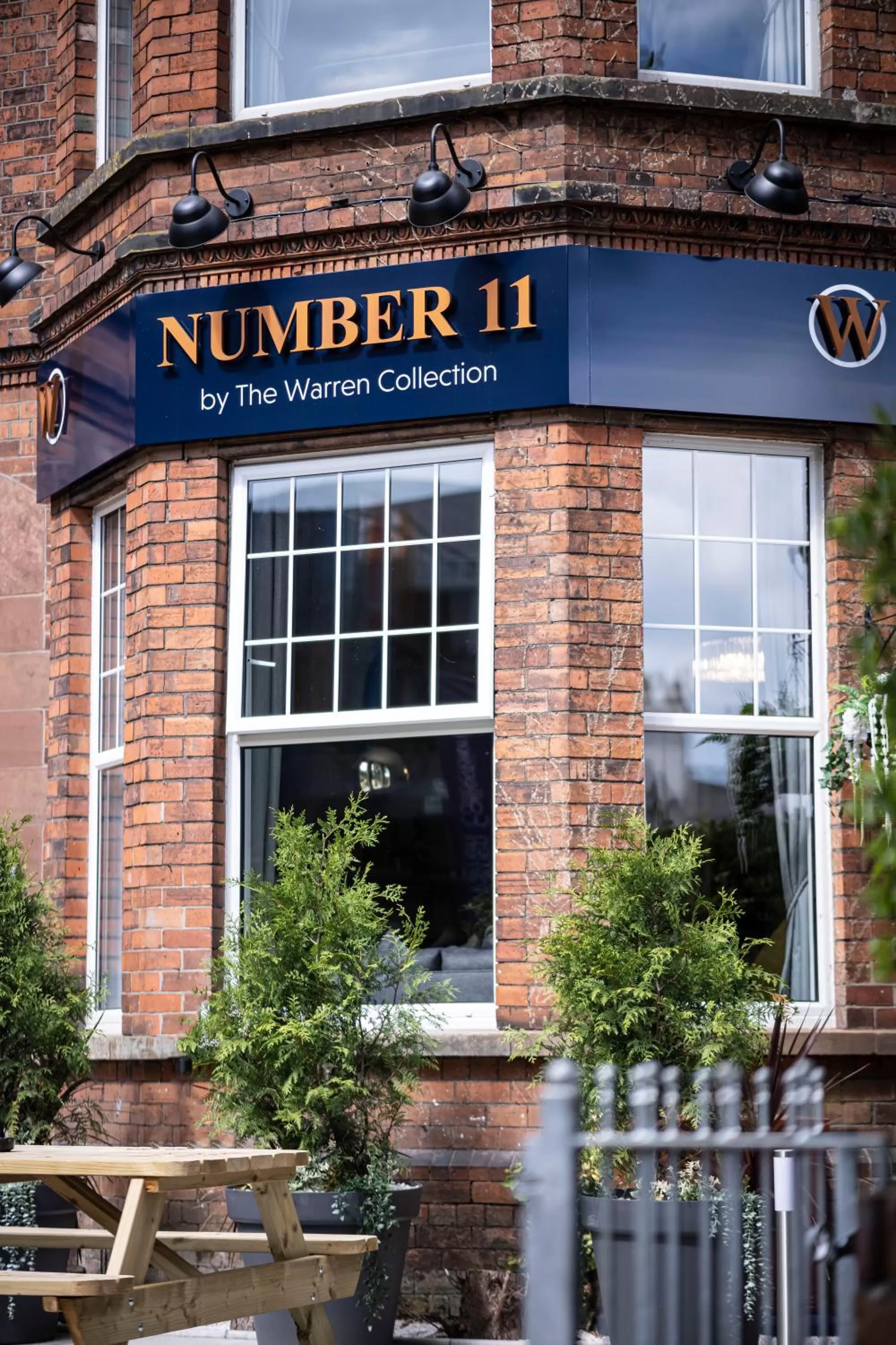 Property logo or sign in Number 11 by the Warren Collection