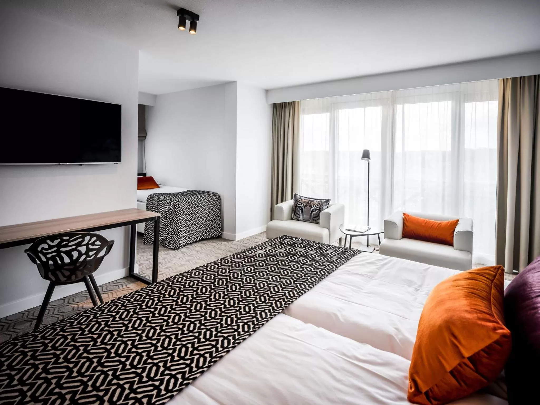 Seating area, Bed in Hotel Van der Valk Maastricht