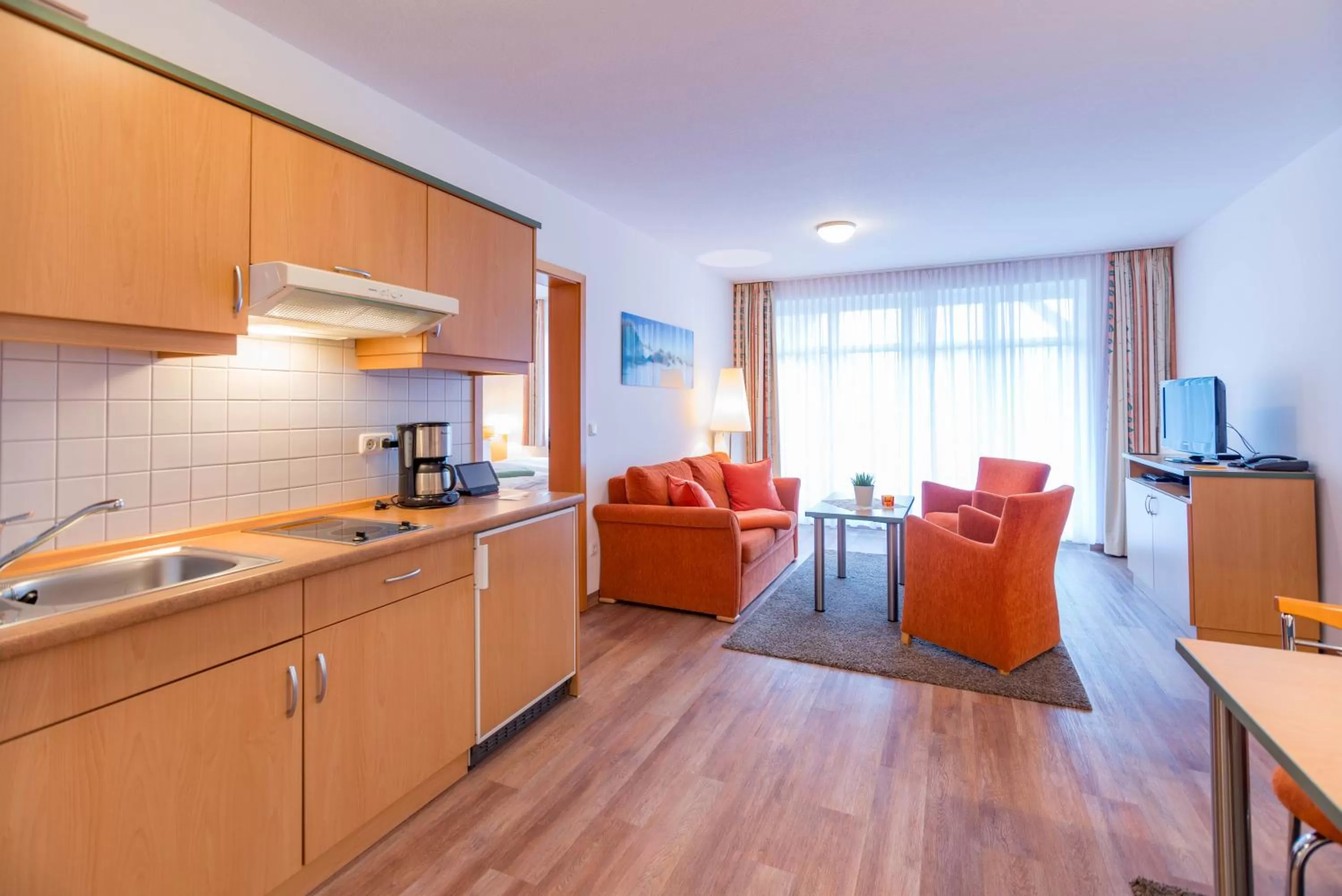 Photo of the whole room, Kitchen/Kitchenette in Am Weststrand Apartmenthaus Waldeck