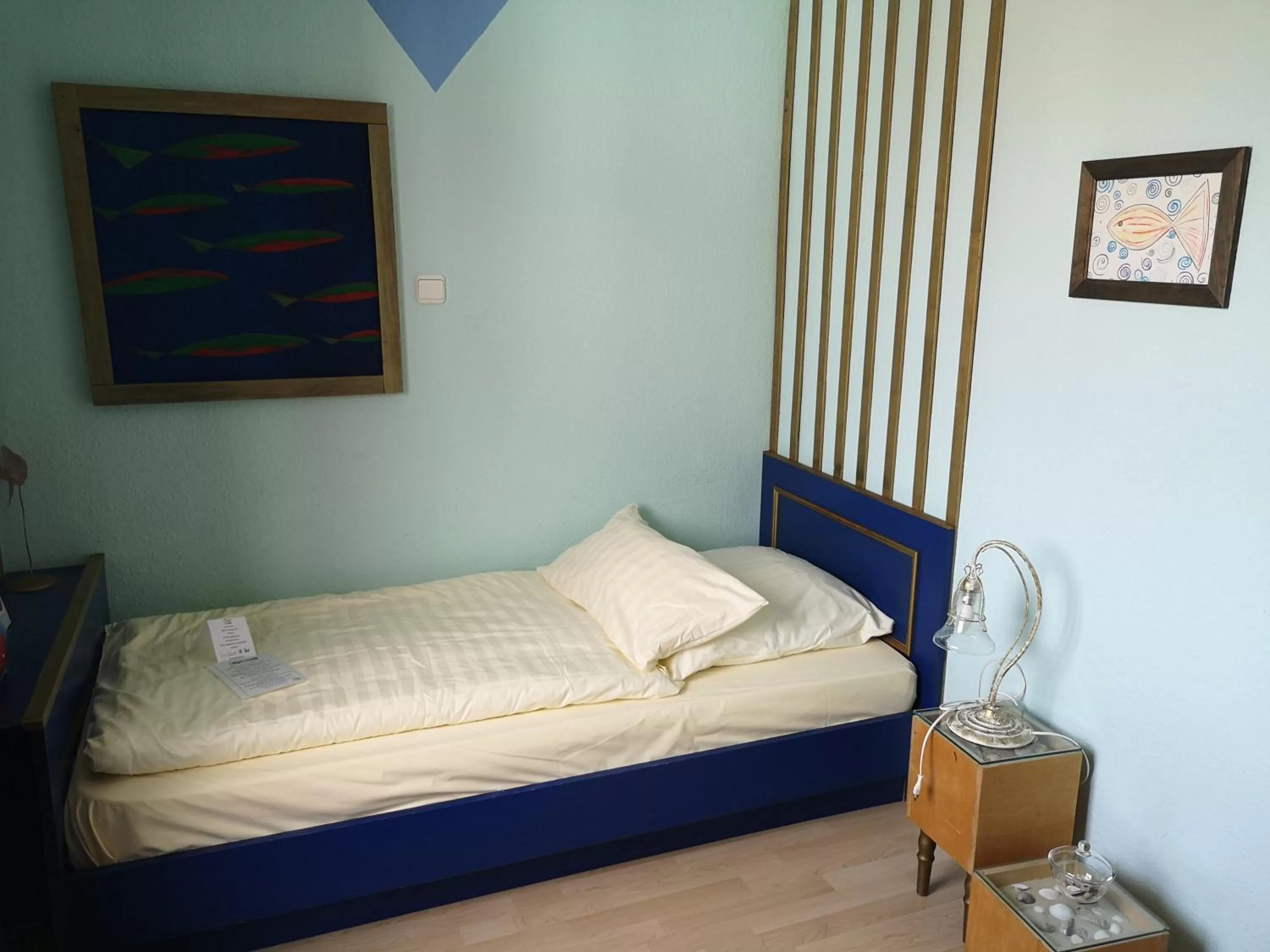 Photo of the whole room, Bed in Hotel Goldflair am Rathaus