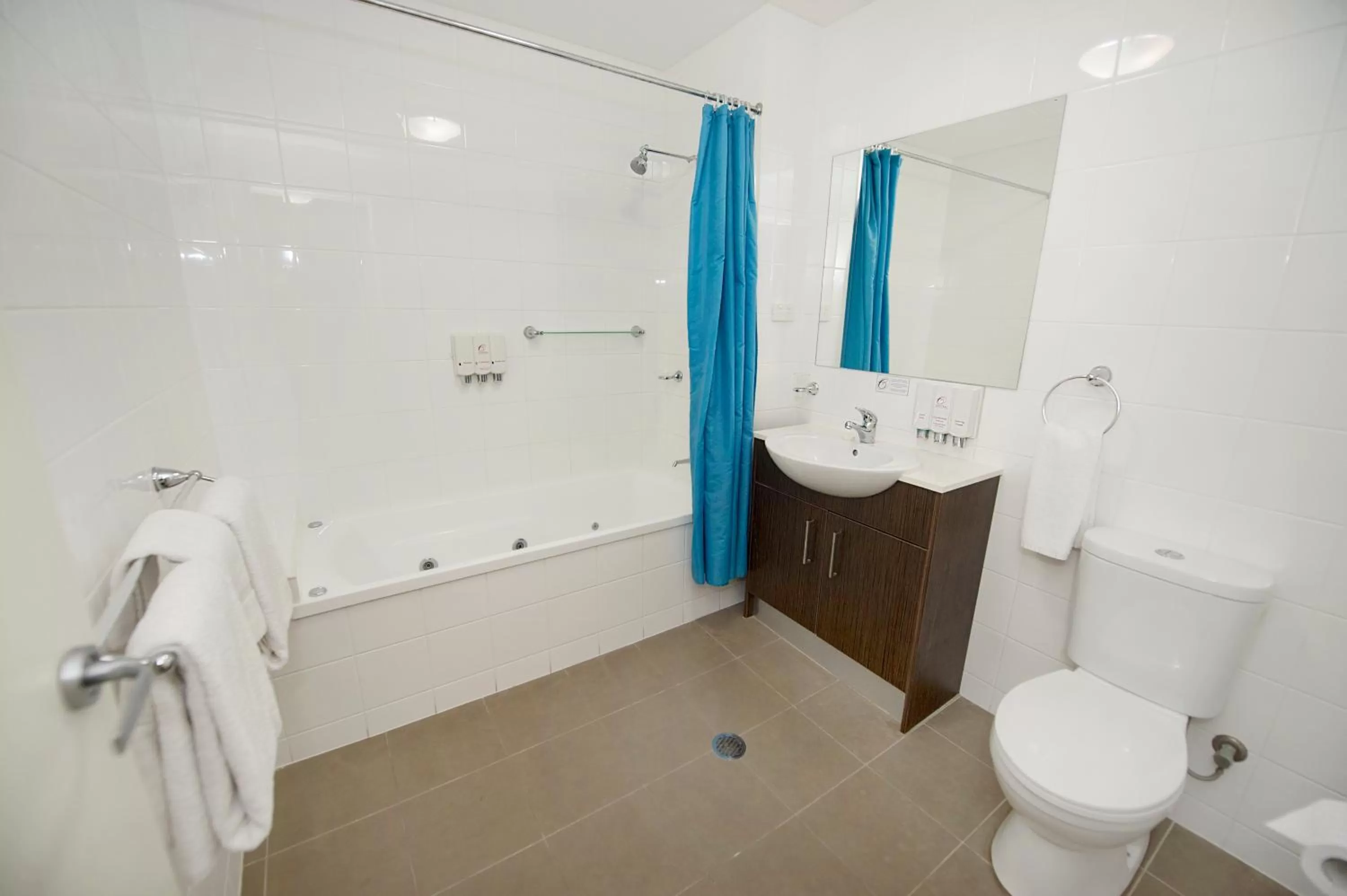 Bathroom in Gladstone City Central Apartment Hotel Official