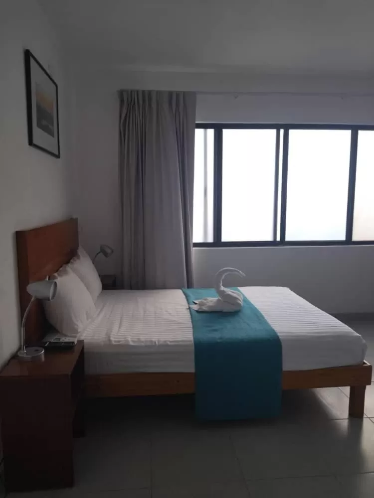 Bed in Casa de huéspedes Taino