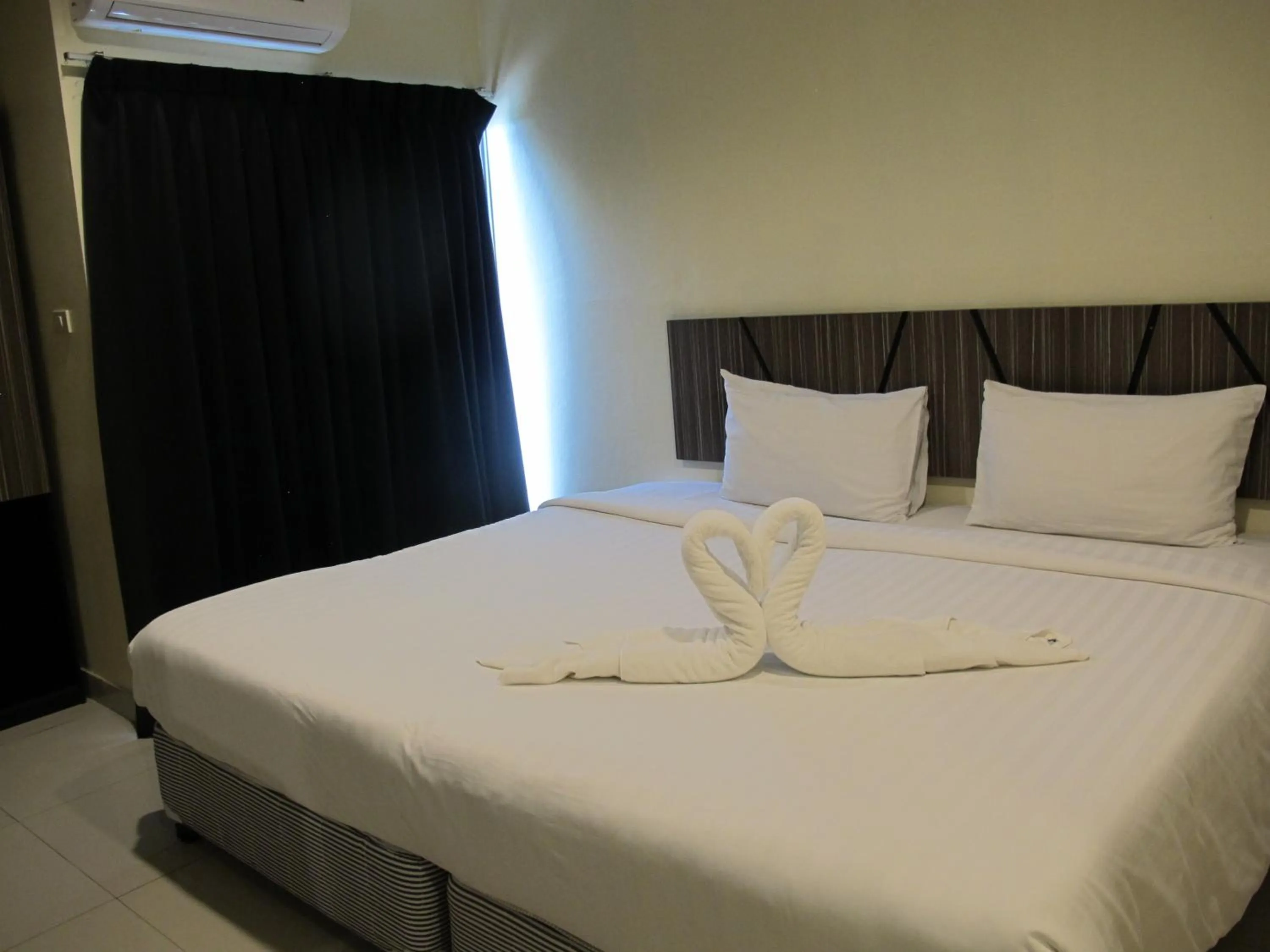 Bed in AIRY Suvarnabhumi Hotel