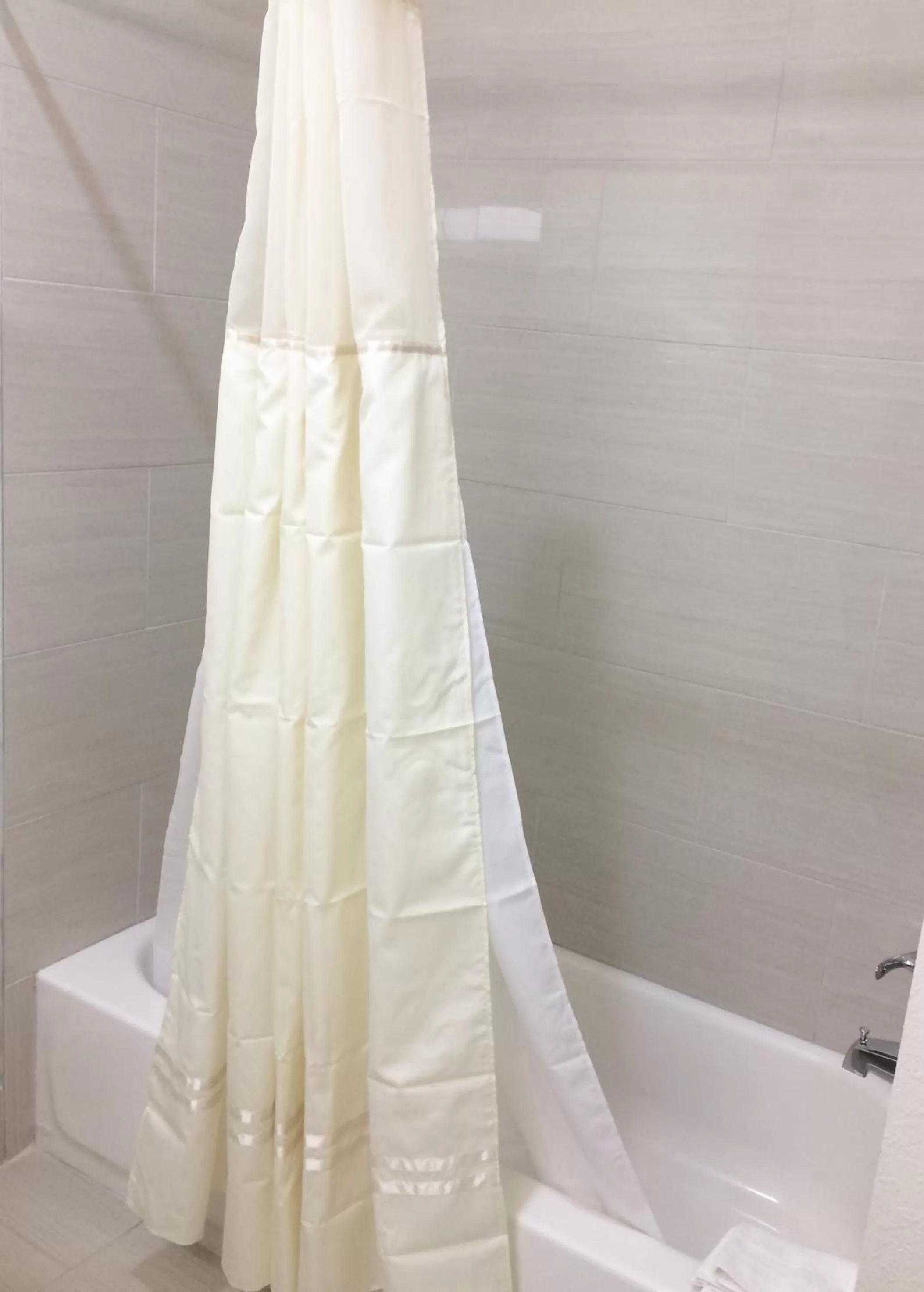 Shower in Scottish Inn & Suites - Conroe