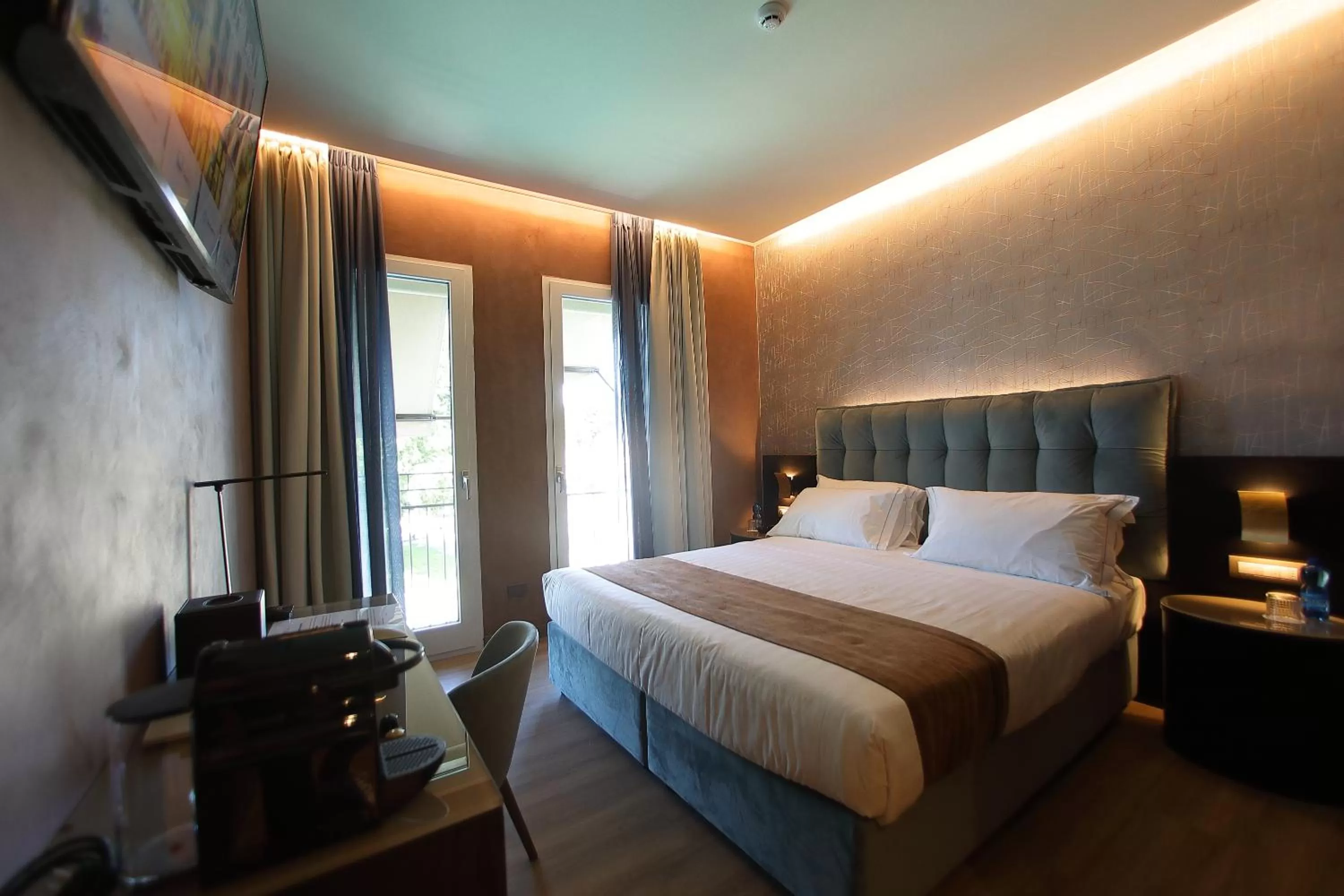 Bed in Hotel Bell'arrivo by Dori