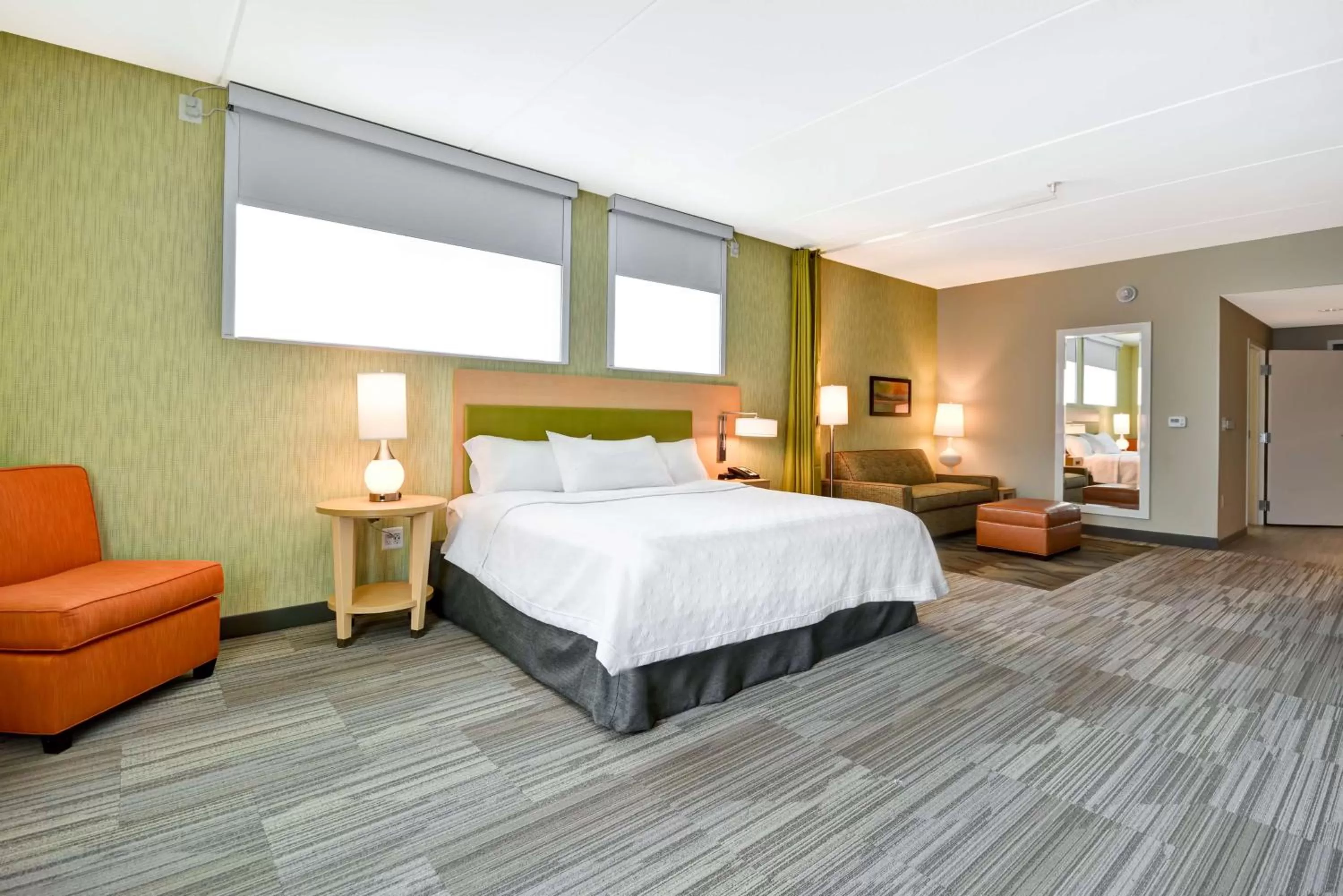 Living room, Bed in Home2 Suites By Hilton Charles Town