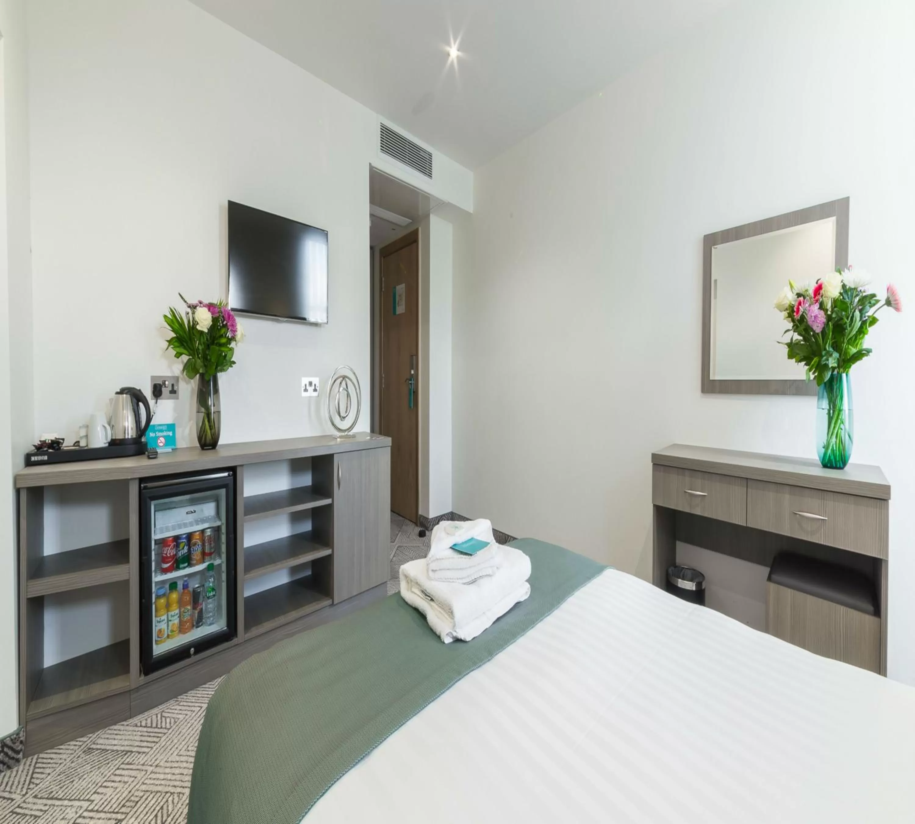 Decorative detail, Bed in The Lion & Key Hotel