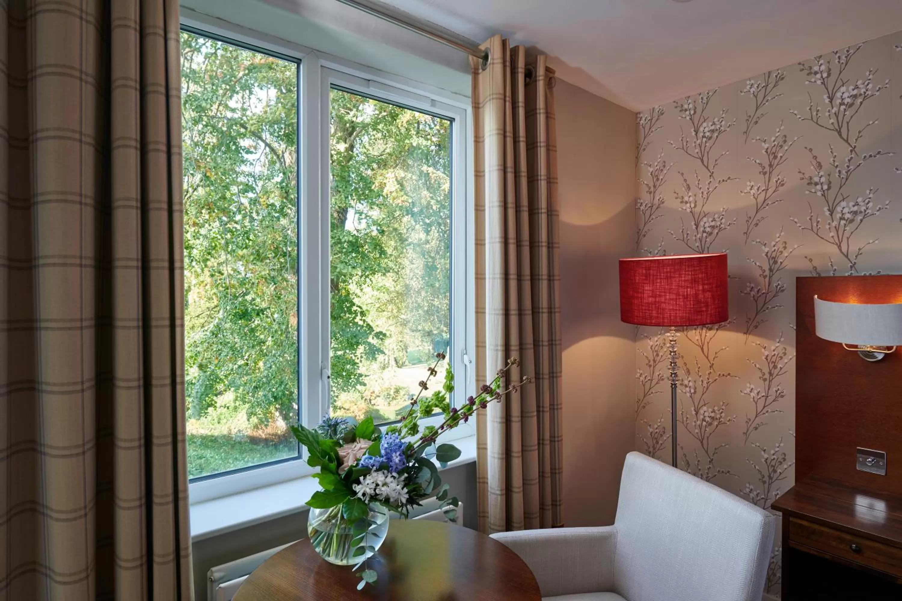 Seating area, Bed in The Belsfield Hotel