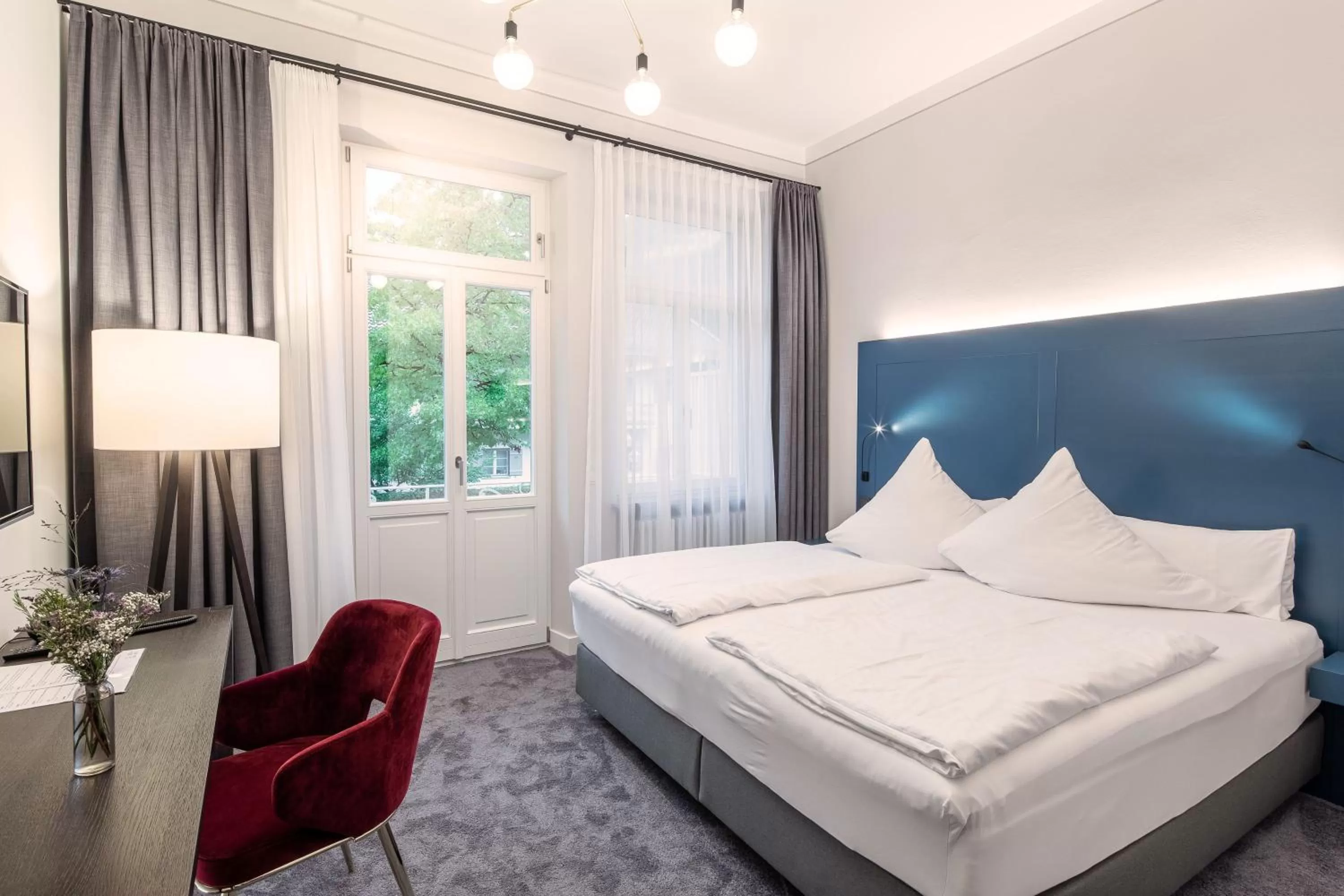 Bed in Villa Rein Boutiquehotel