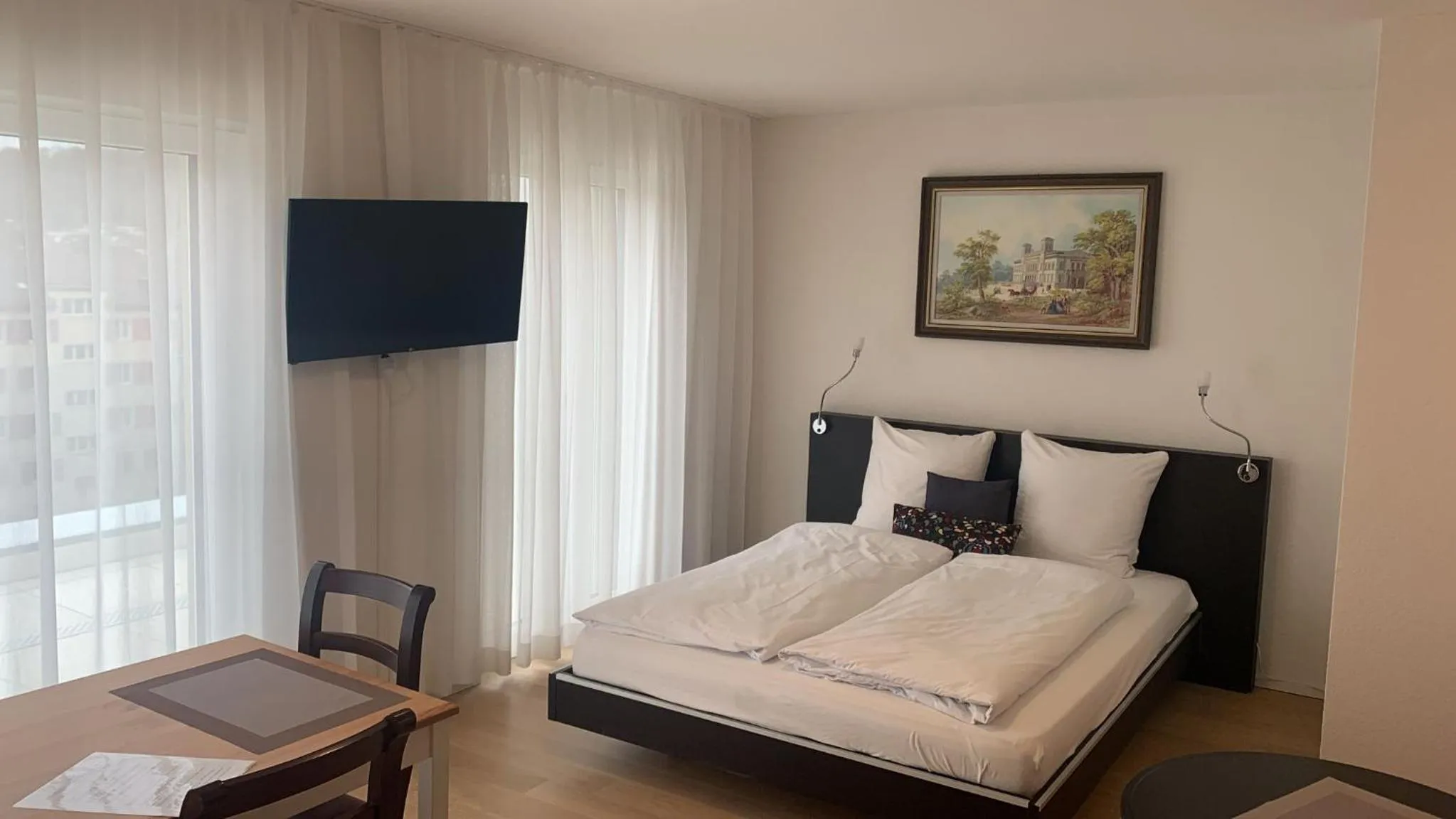 Photo of the whole room, Bed in Swiss Star Zurich Oerlikon - Self Check-In