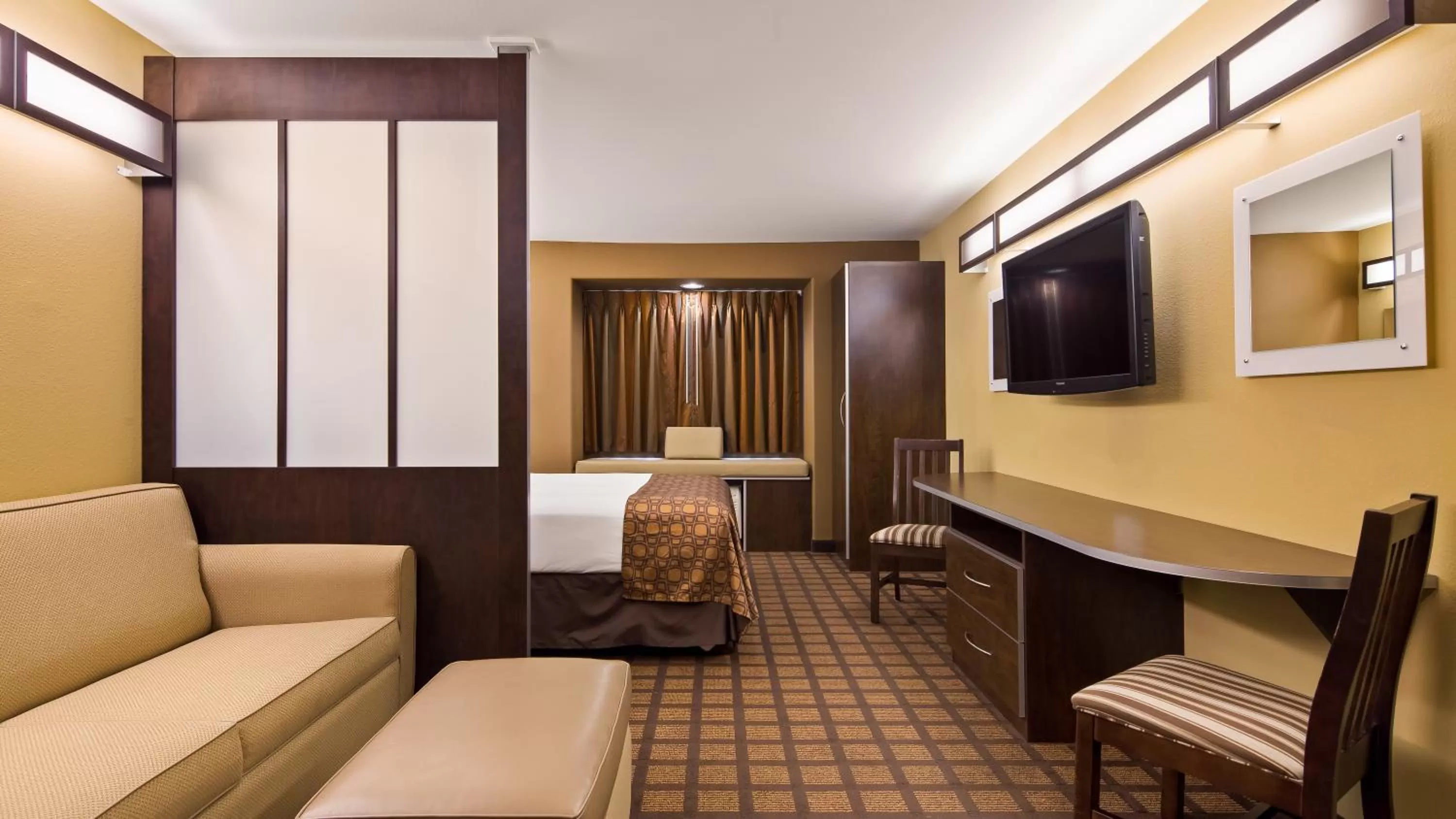Bed in Microtel Inn & Suites by Wyndham Round Rock