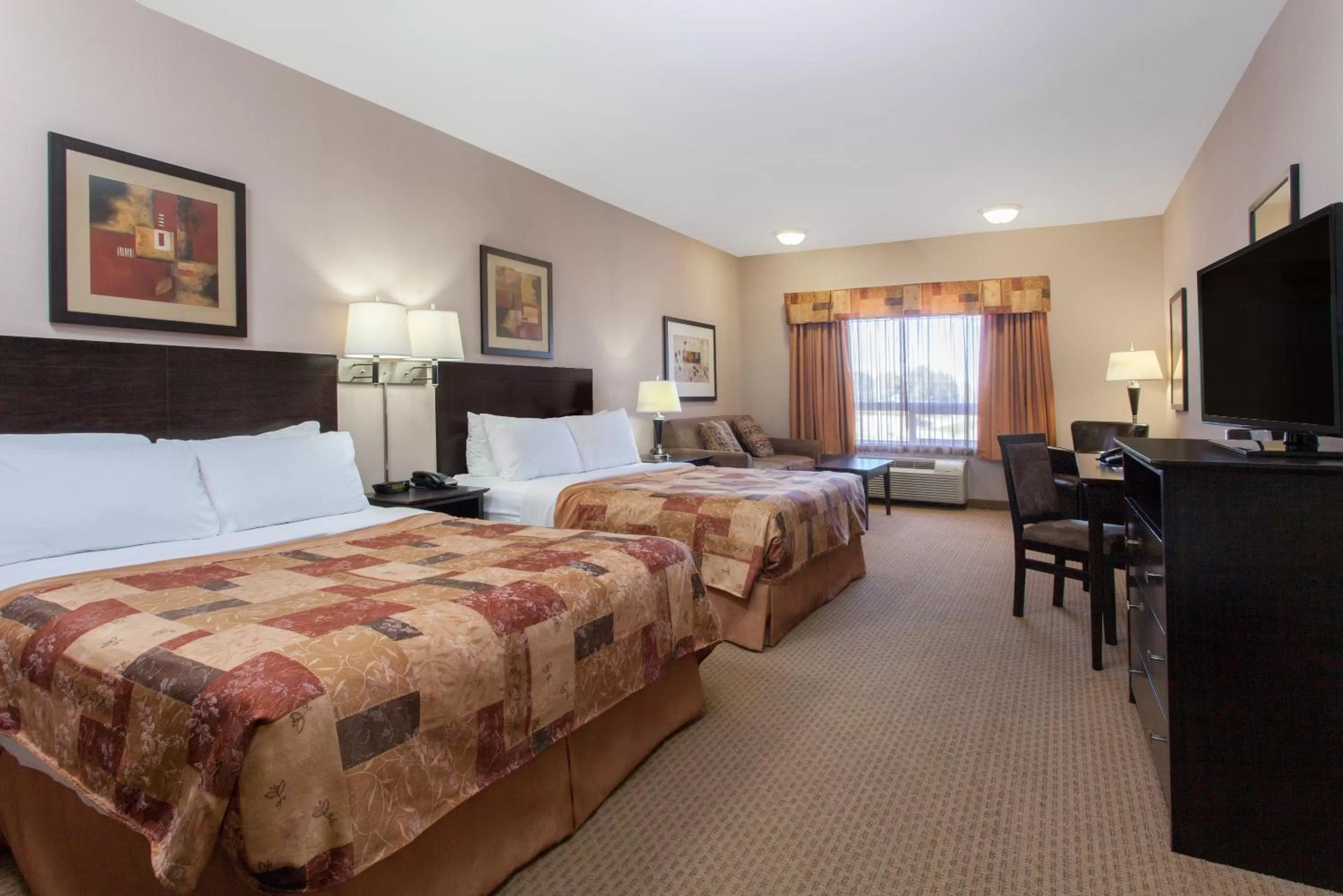 Photo of the whole room, Bed in Ramada by Wyndham Brooks