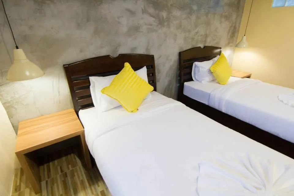 Bed in K.L. Boutique Hotel