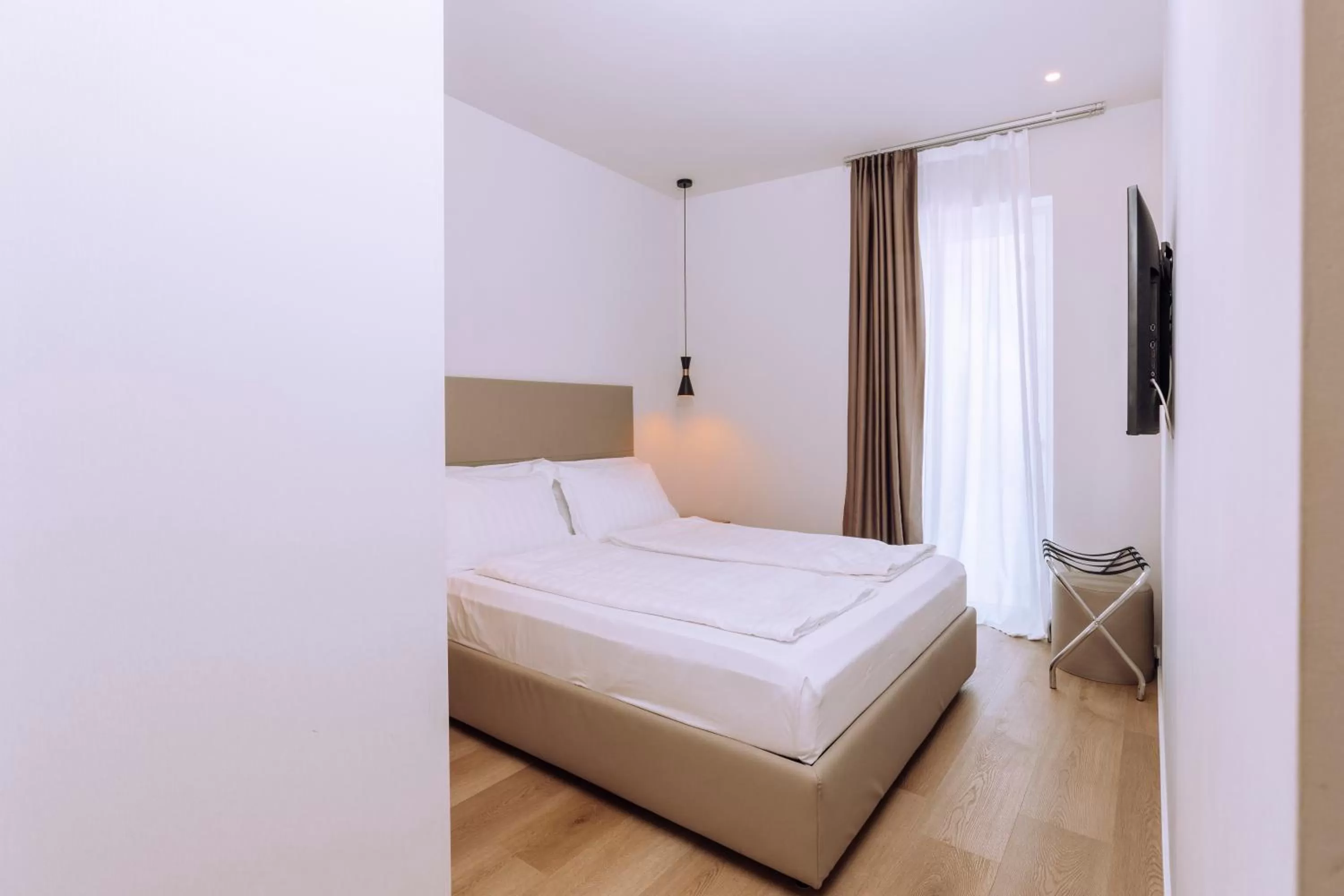 Bed in Ah Porticcioli Boutique Apartments