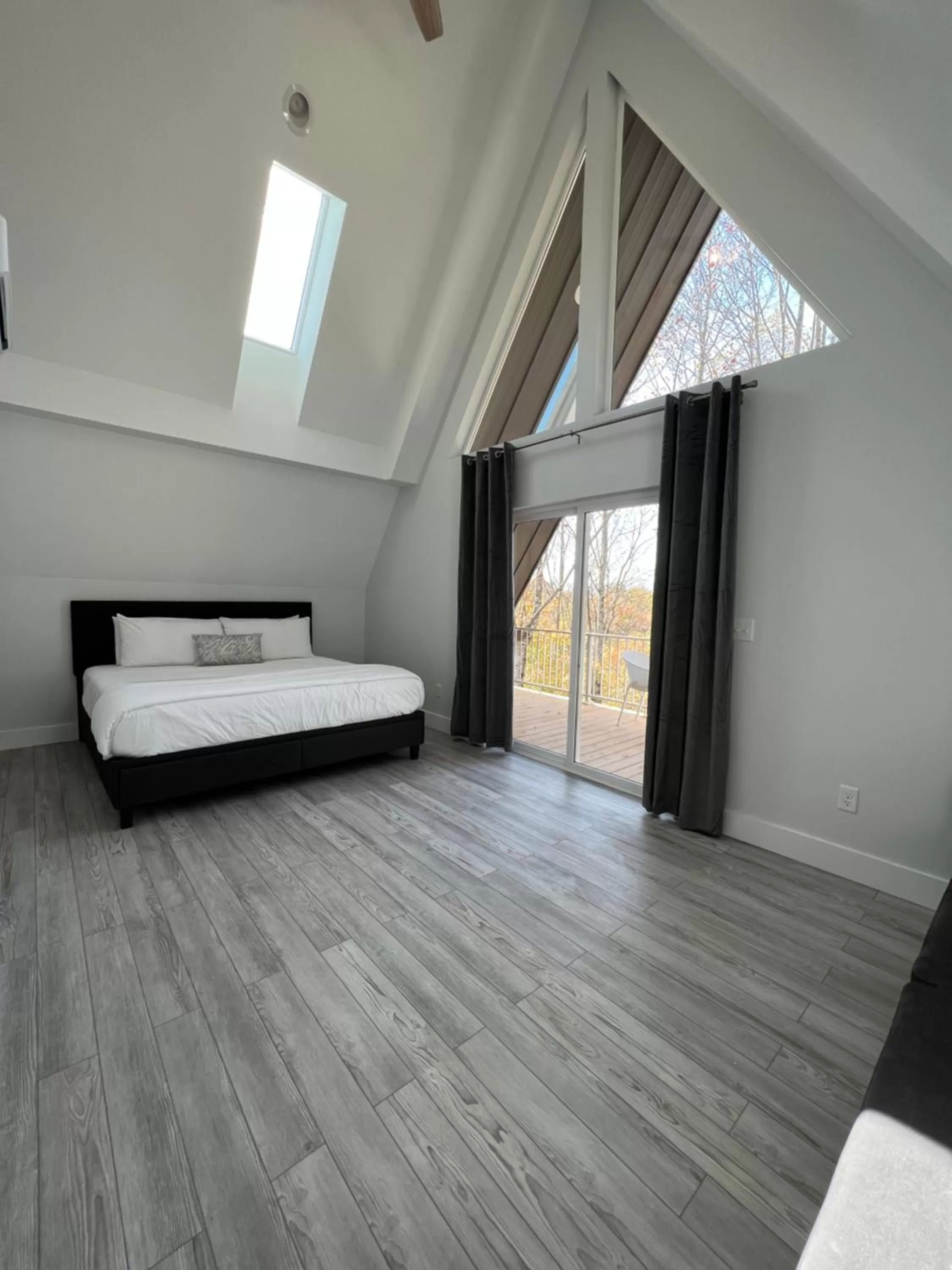 Bed in SKYLARANNA Resort & SPA