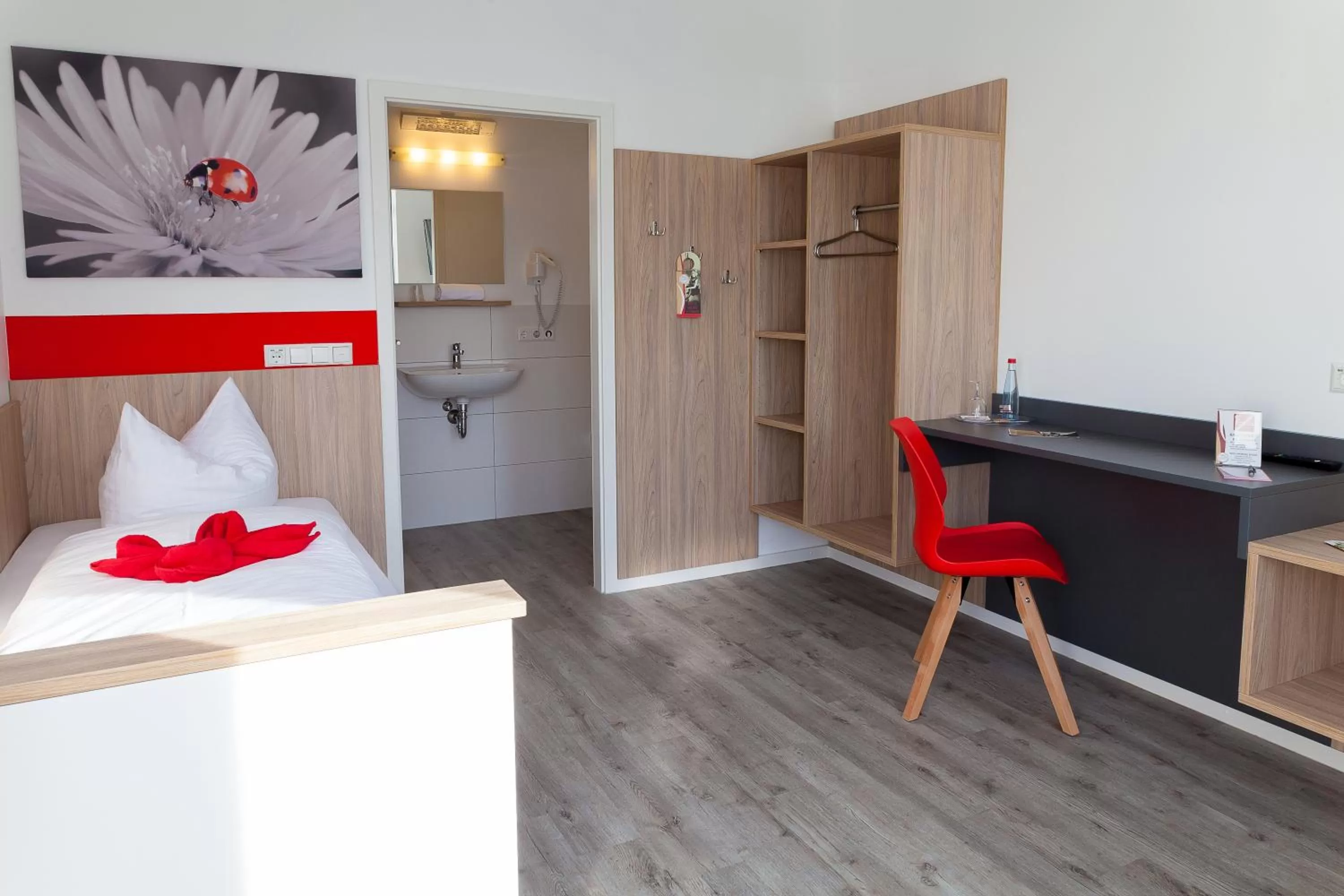 Photo of the whole room, Bed in Hotel Hohenloher Tor