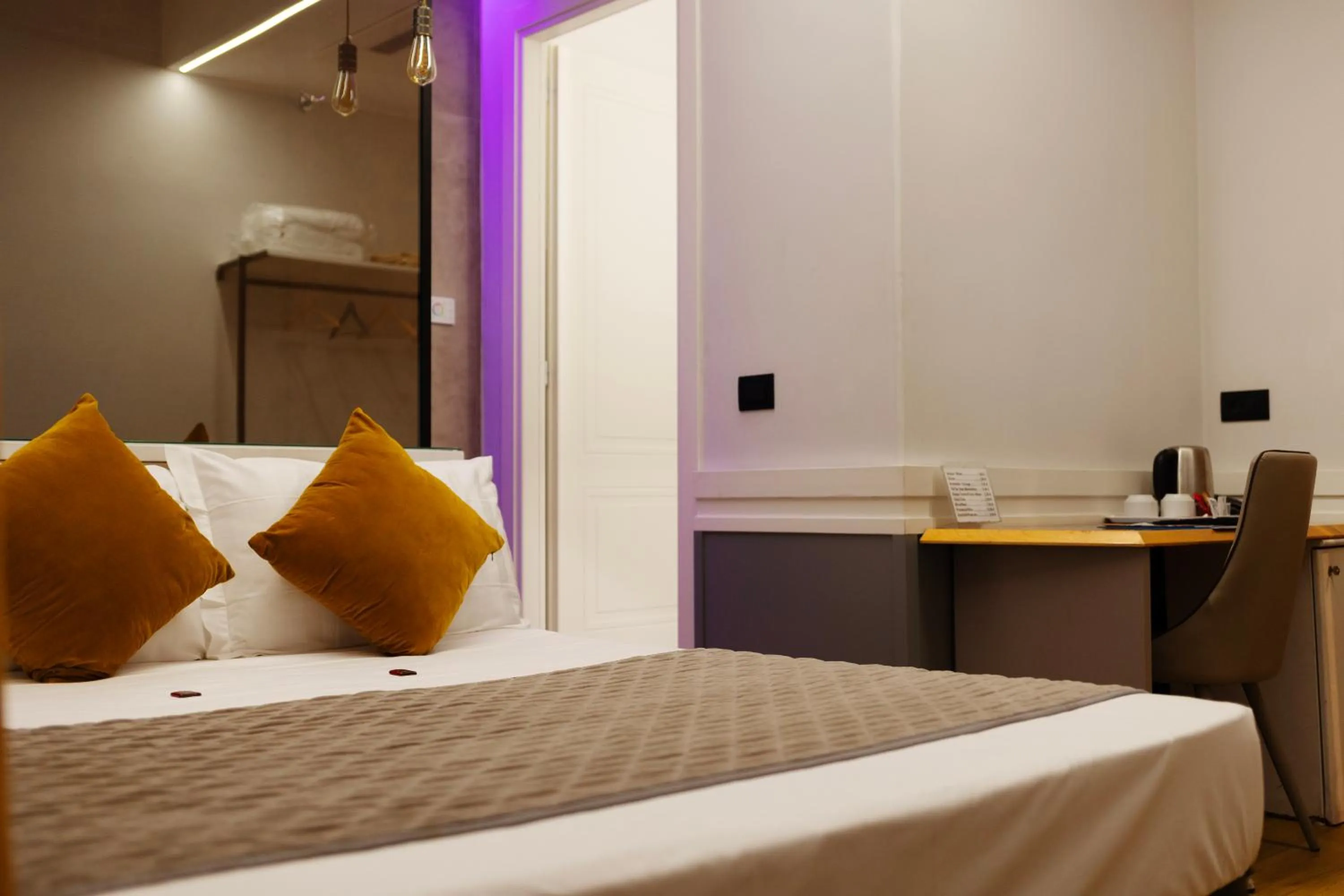 Bed in Hotel Giotto Flavia