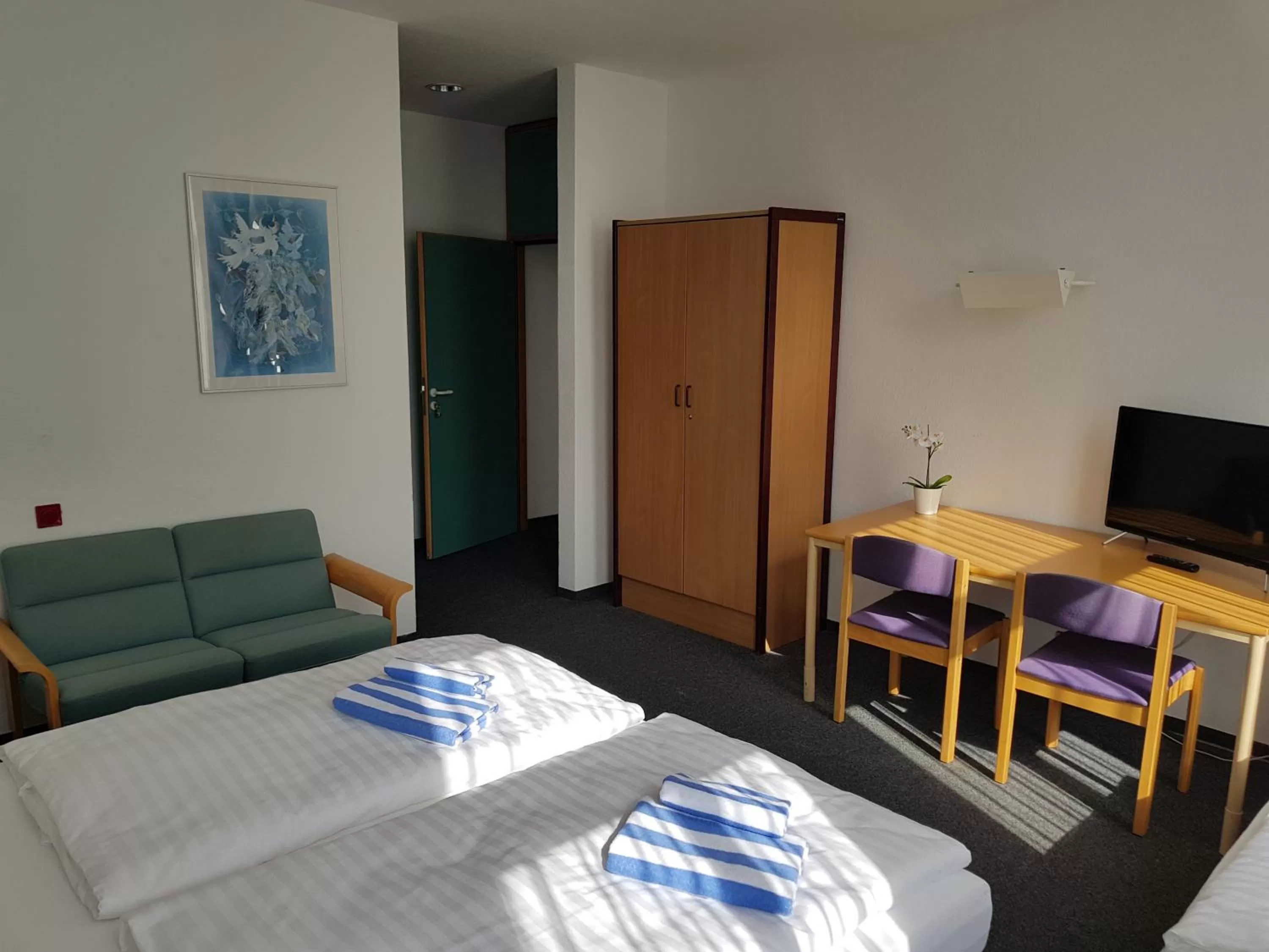Bed in Appartement-Hotel Rostock