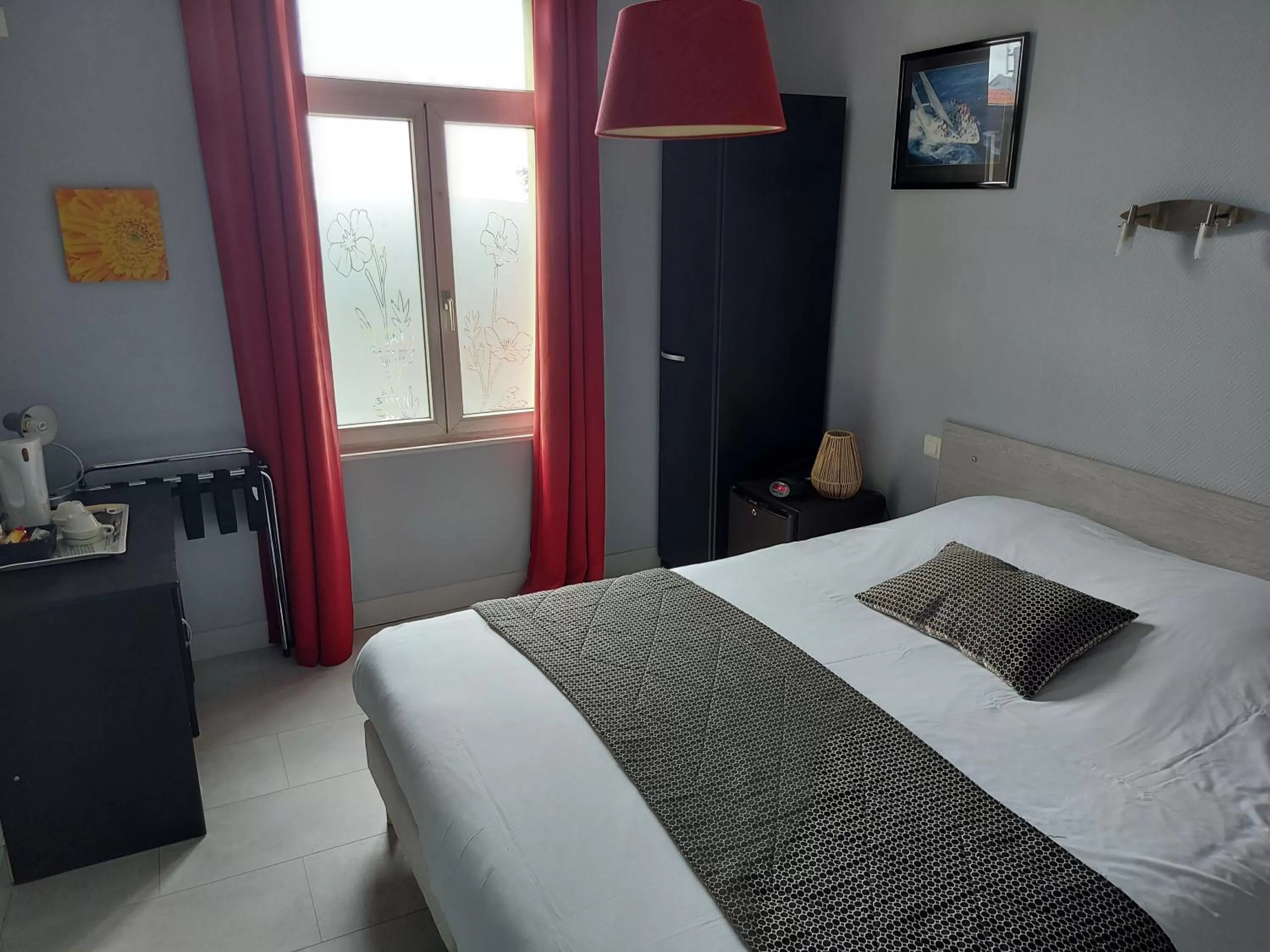 Bed in Hotel De La Paix