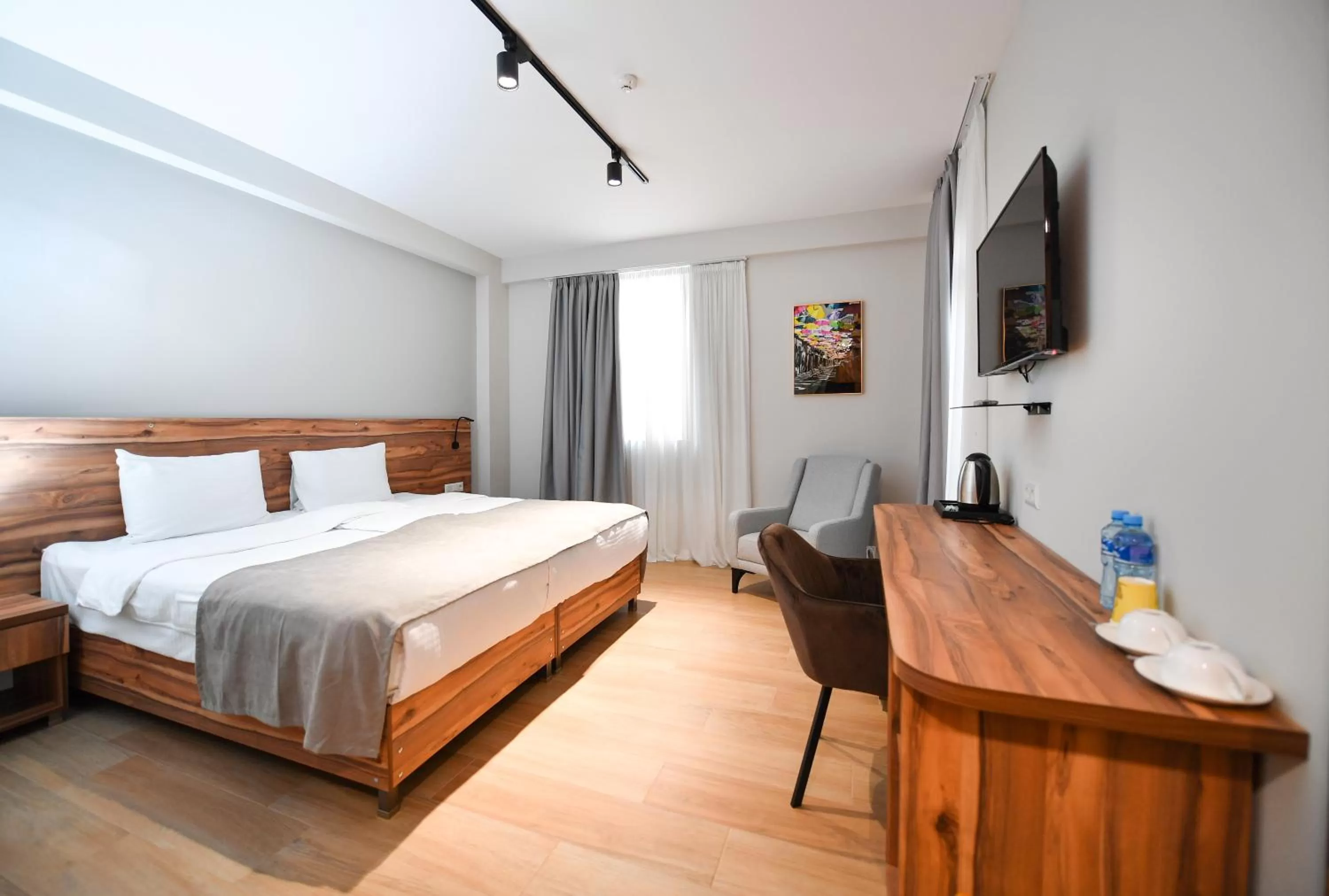 Communal lounge/ TV room, Bed in Address Boutique Hotel