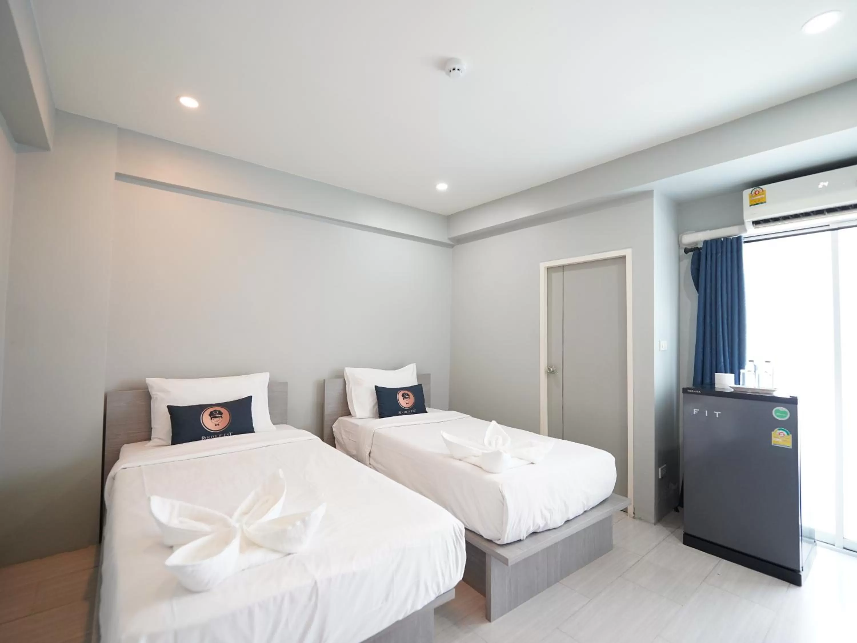 Bed in RoomQuest Bangkok Don Mueang Airport