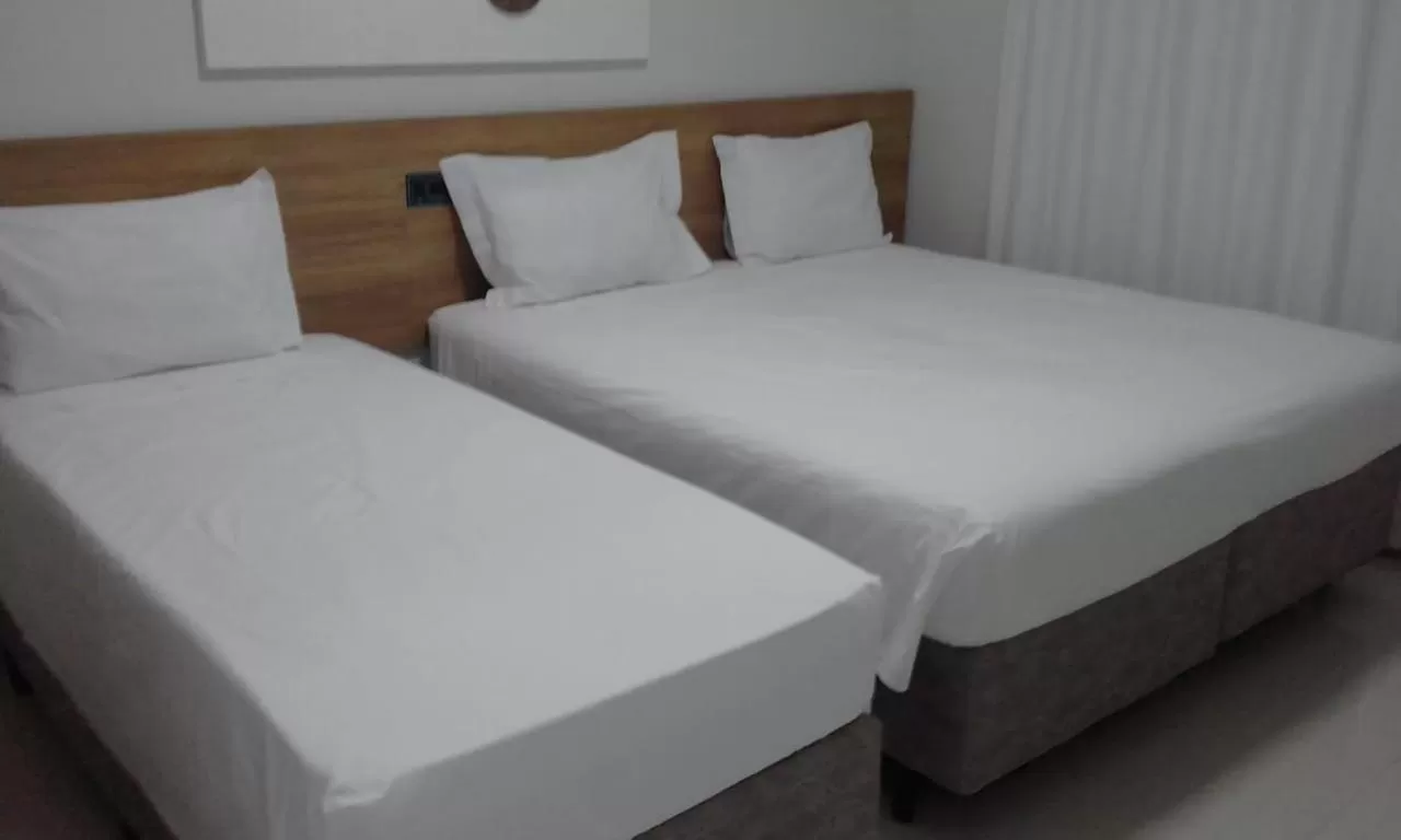 Bed in Regional Plaza Hotel Event Park