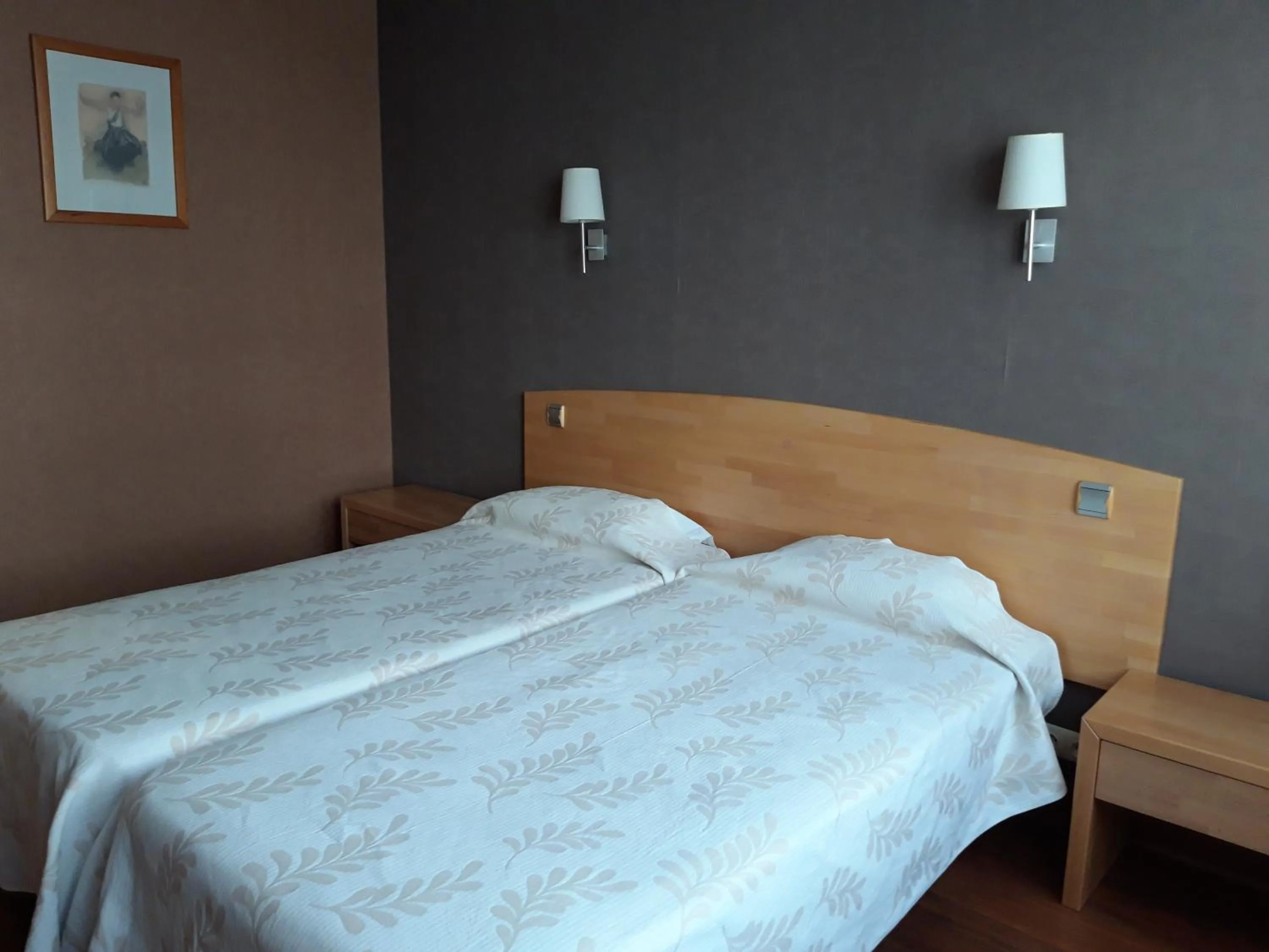 Bed in Hôtel la Guimbarde