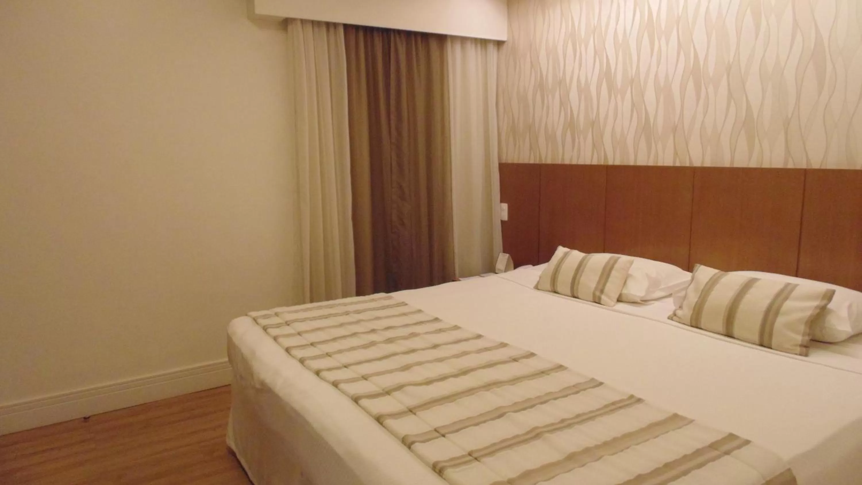 Bed in Mirasol Copacabana Hotel