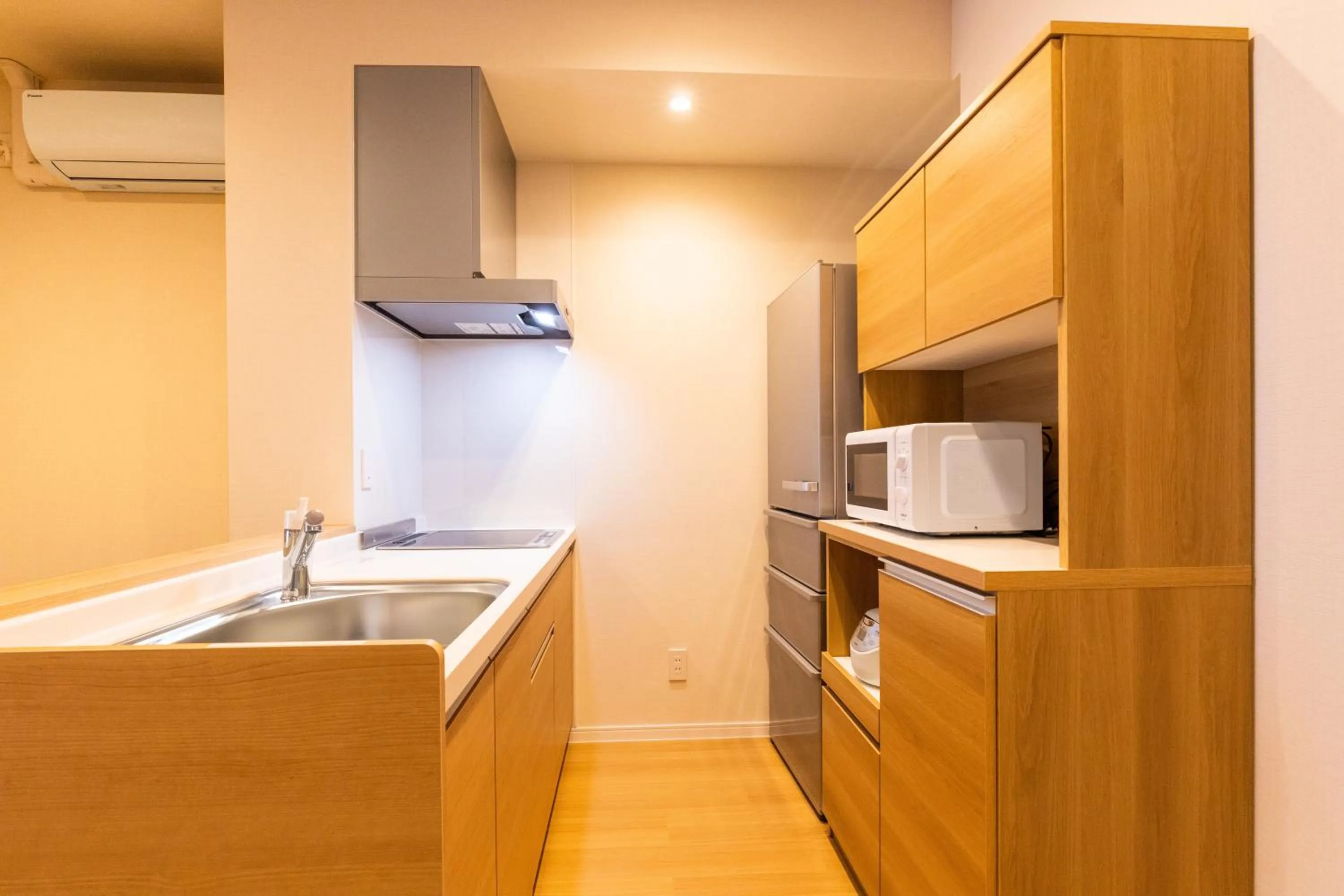 Kitchen or kitchenette in LAPIN MIHAMA Residence Hotel