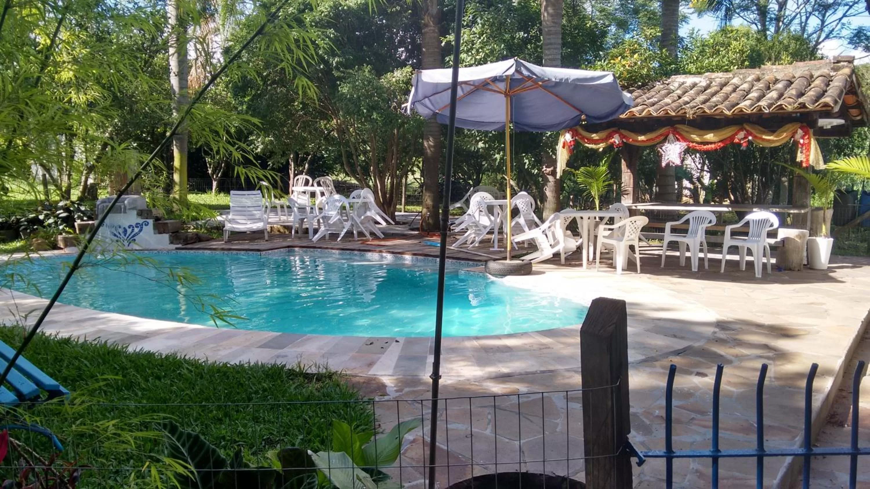 Swimming pool in Hotel Chácara das Flores