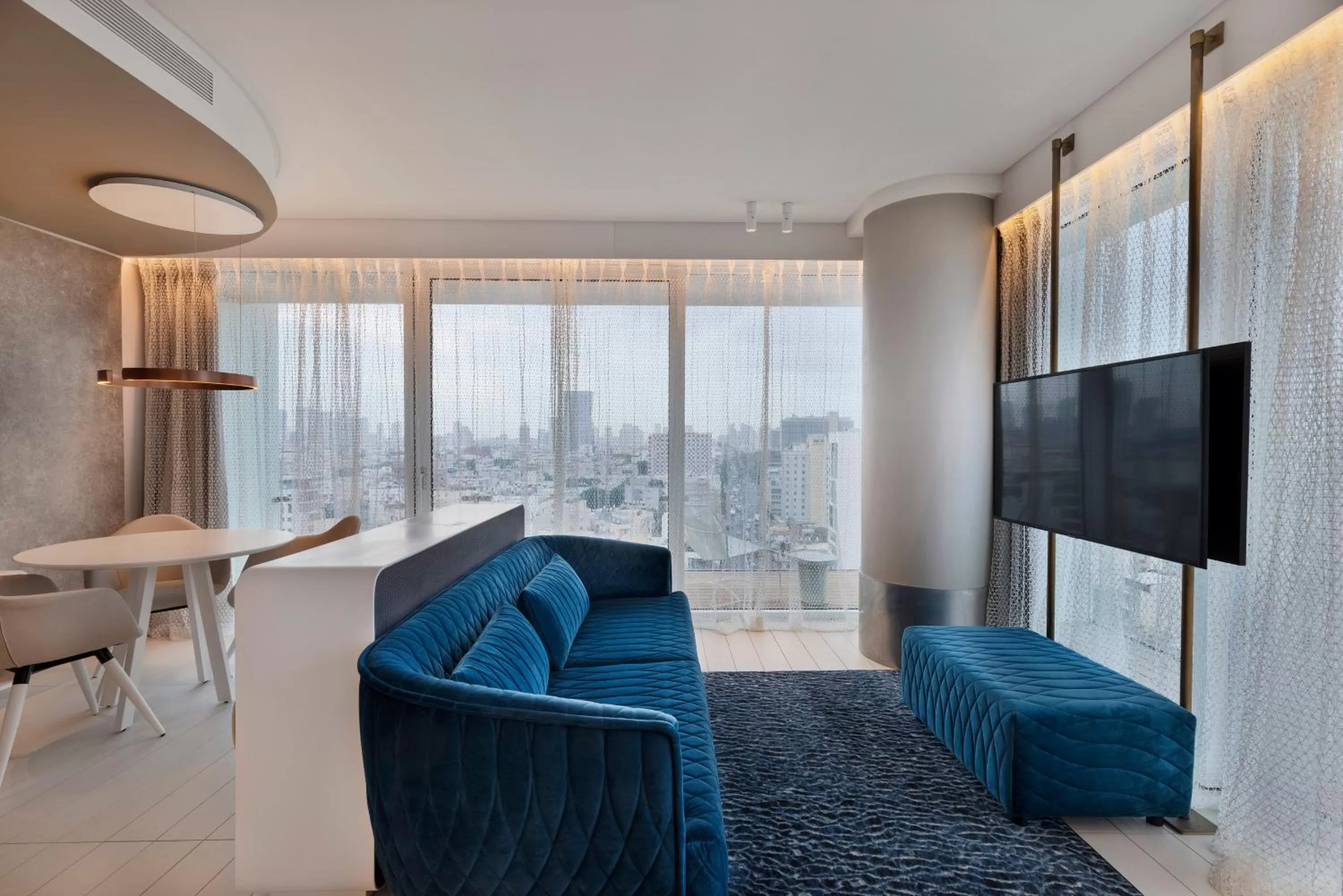 Living room in Port Tower by Isrotel Design