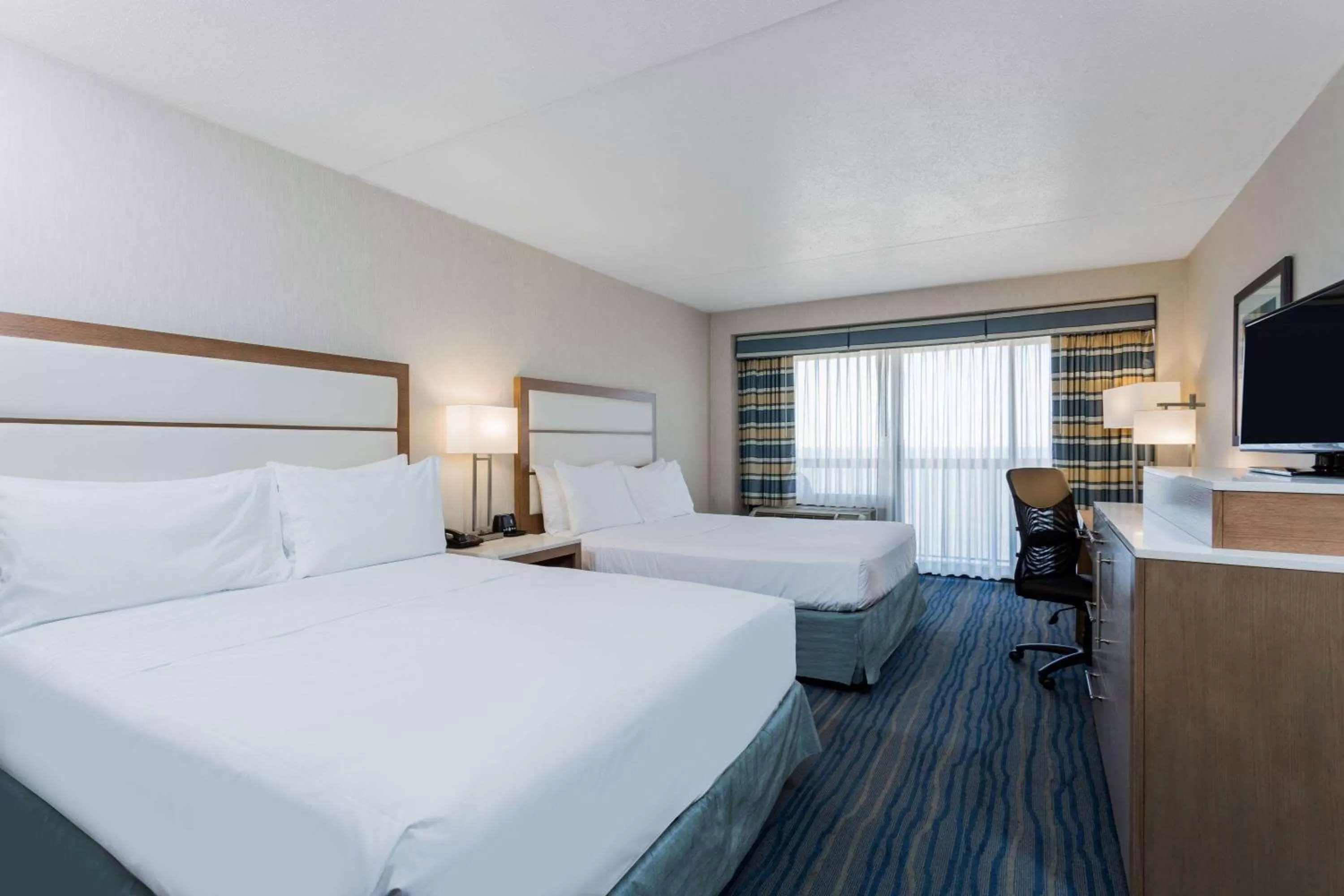 Photo of the whole room, Bed in Wyndham Virginia Beach Oceanfront