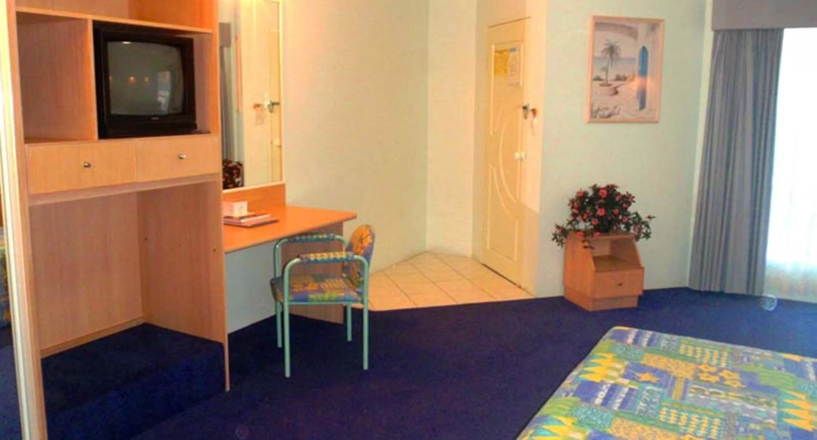 Bedroom in Runaway Bay Motor Inn