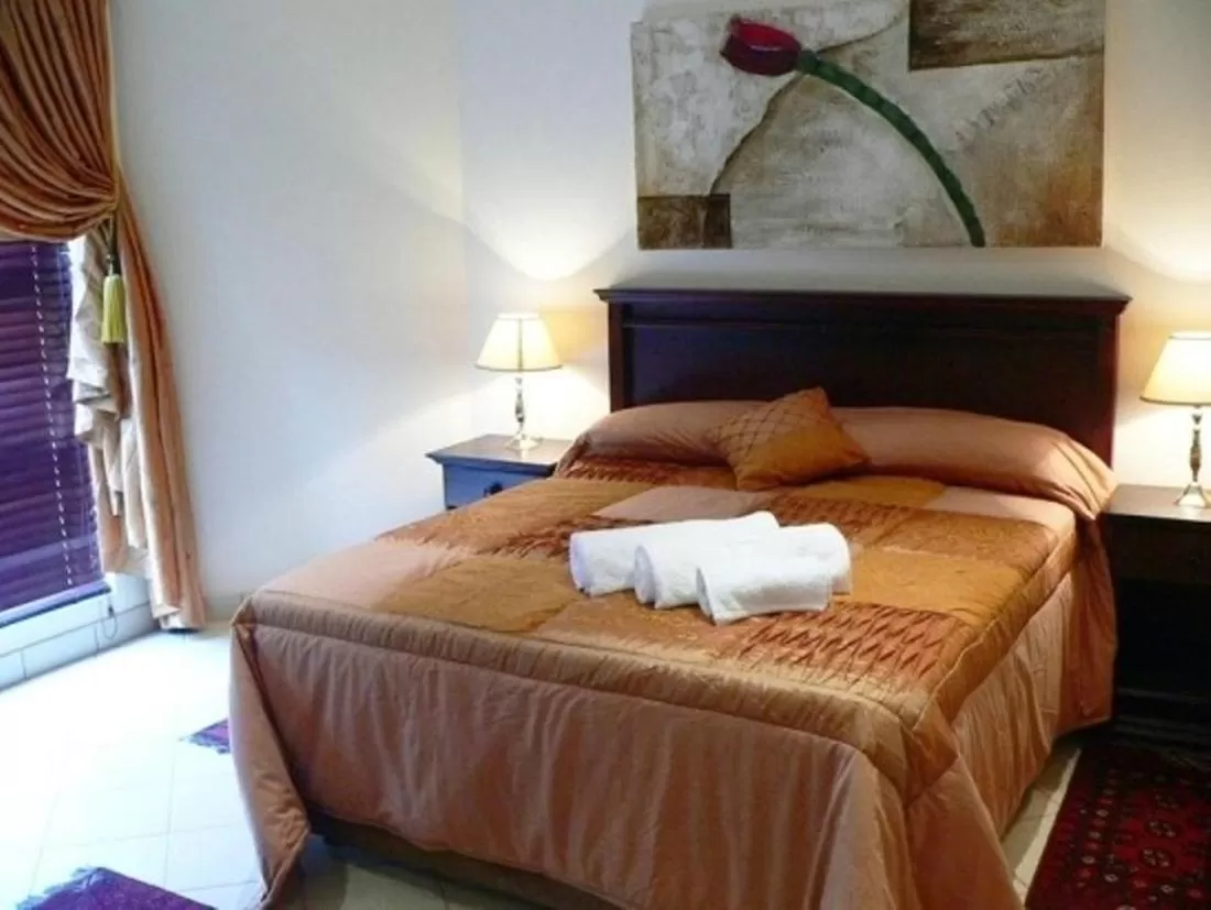 Photo of the whole room, Bed in Rustenburg Boutique Hotel