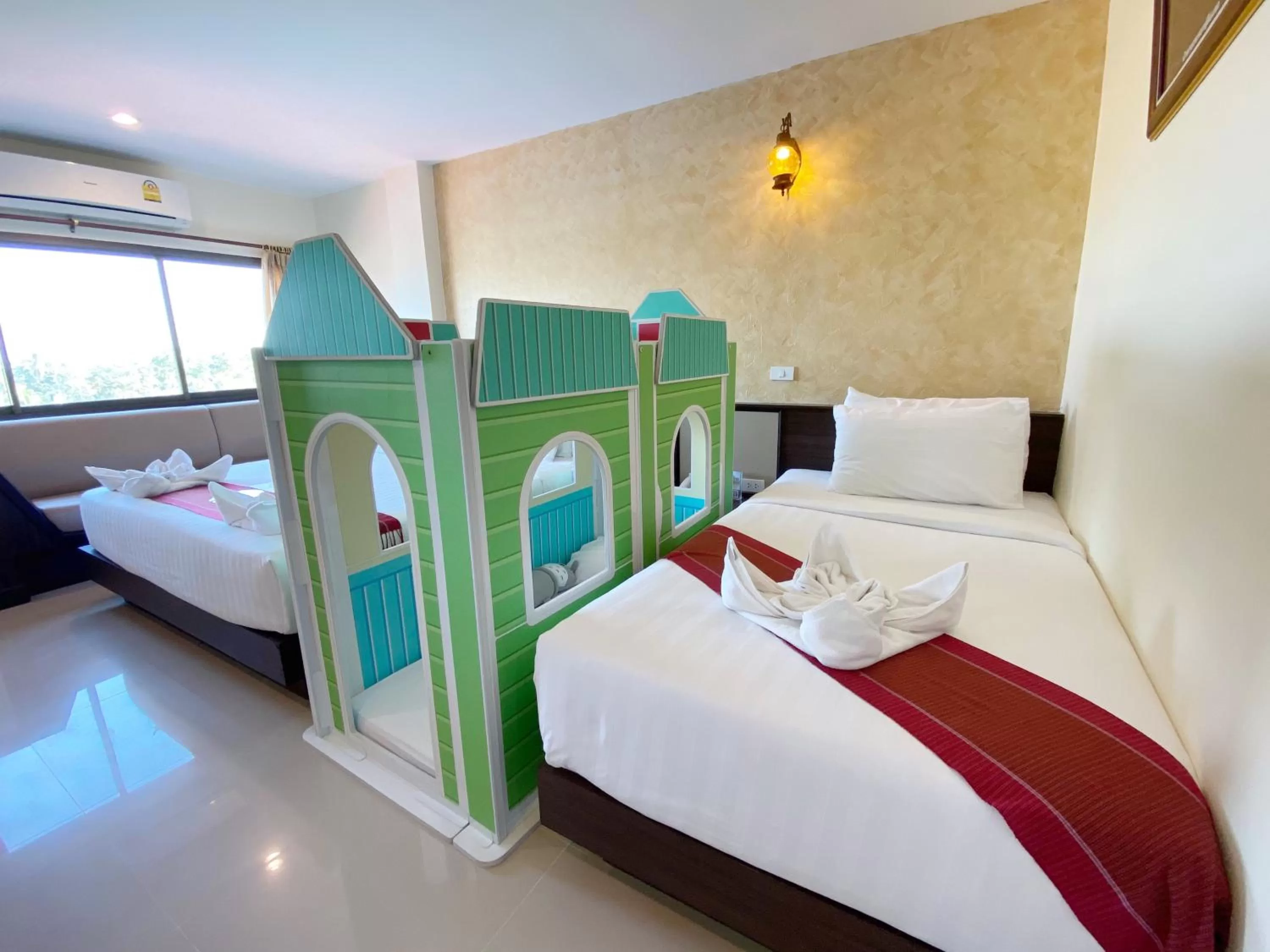 Bed in Phanomrungpuri Hotel Buriram