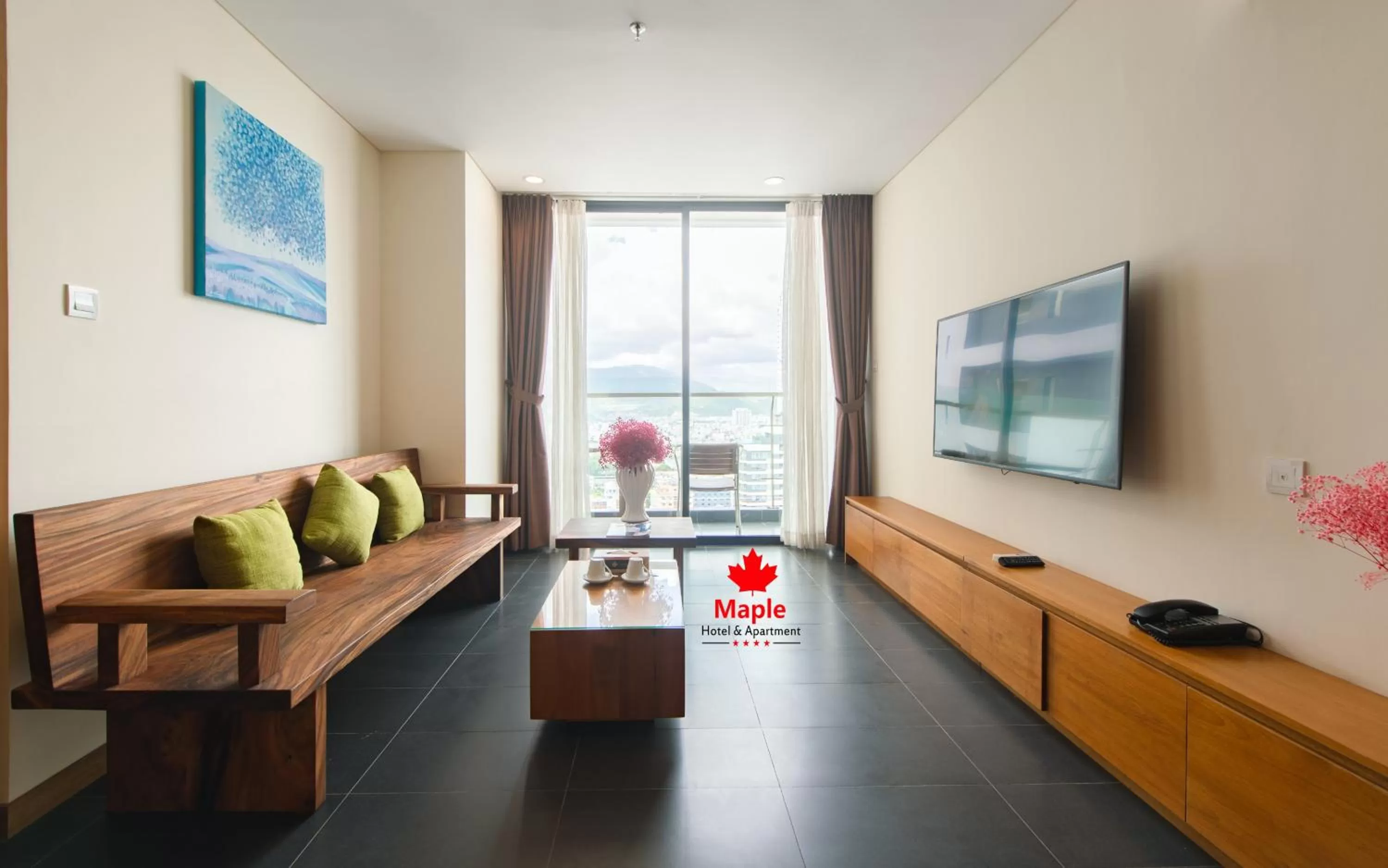 Living room in Maple Hotel & Apartment