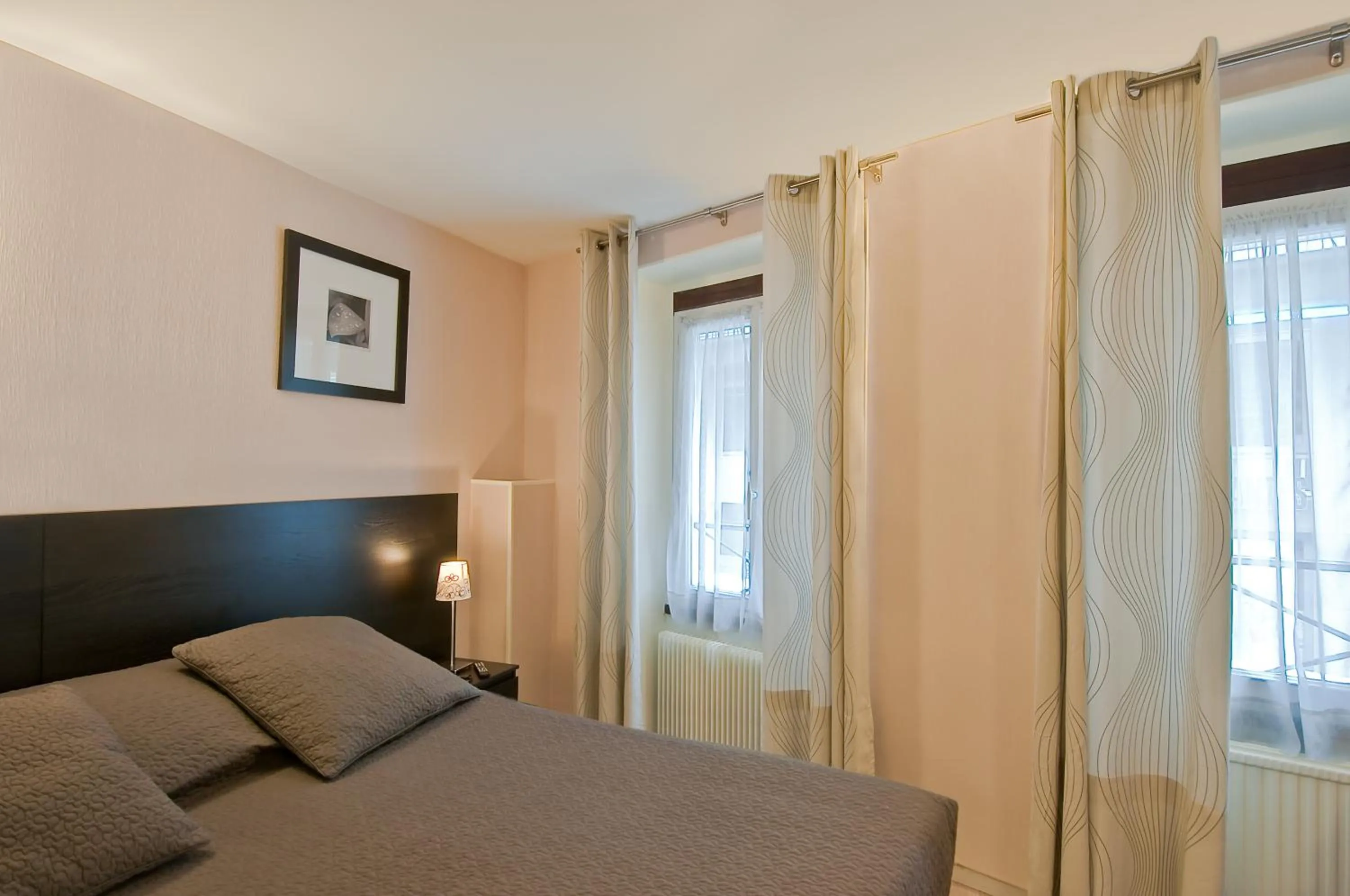 Bed in L'Ouest Hotel