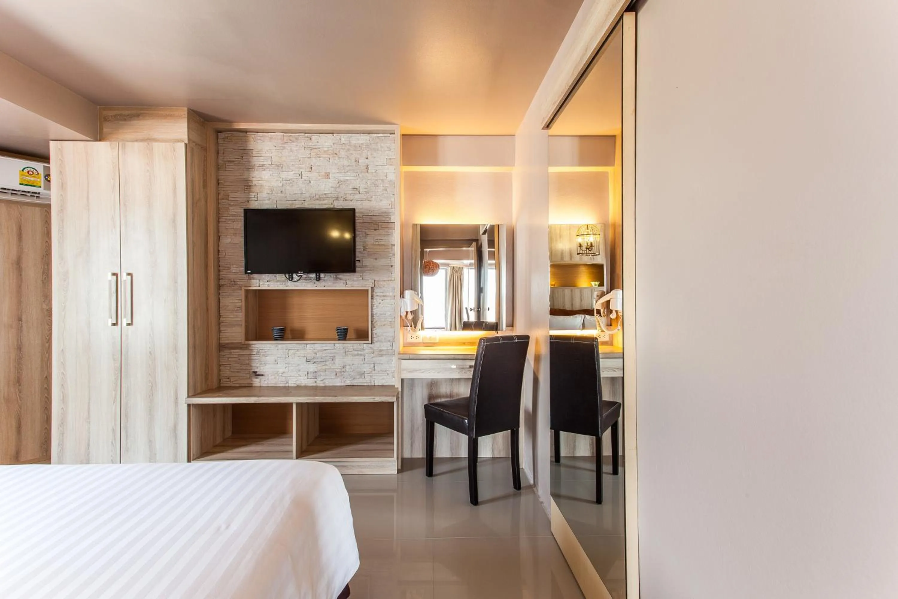 Bedroom, TV/Entertainment Center in Patong Heritage Hotel Phuket - SHA Extra Plus