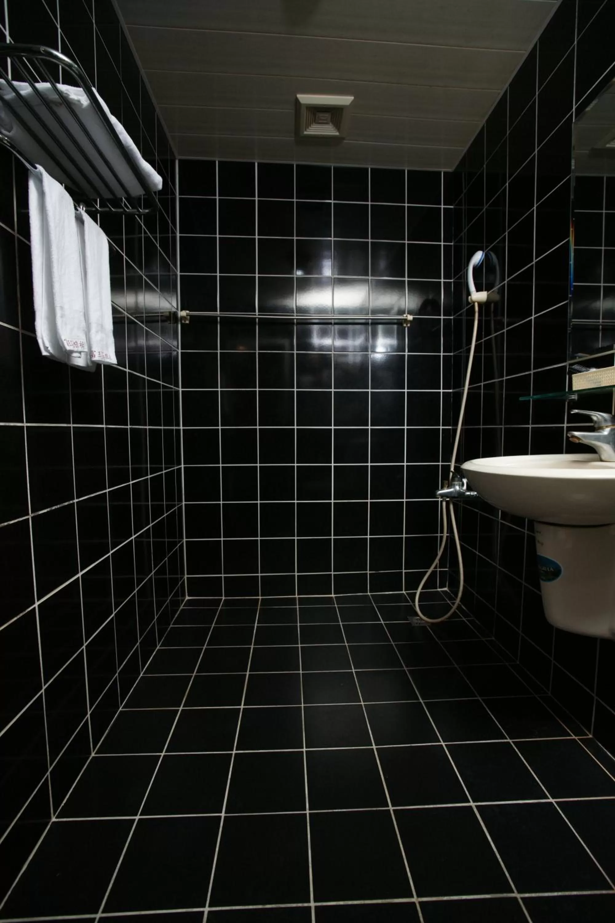 Toilet in Rich Zone Hotel