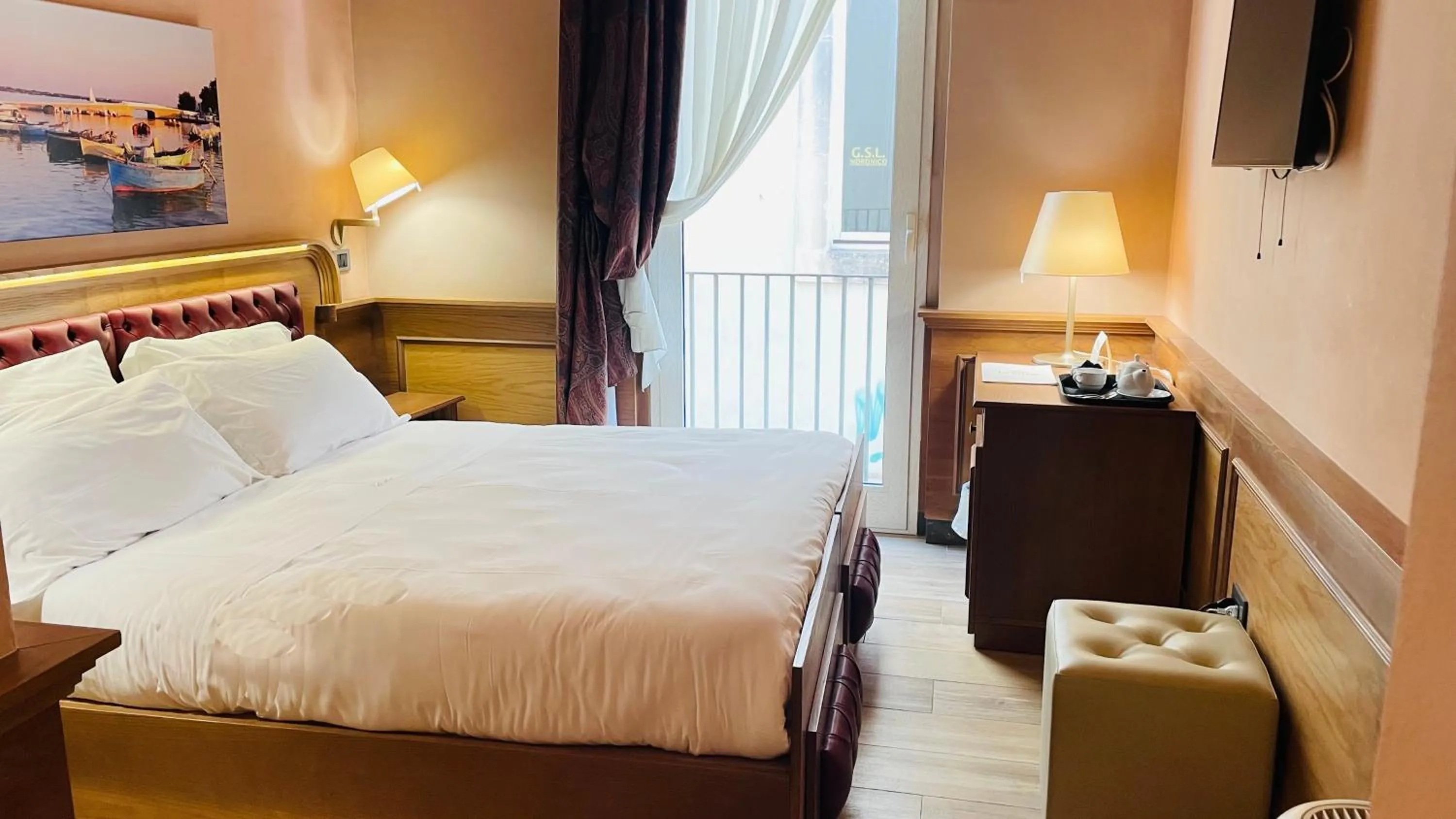 Bed in Le Club Boutique Hotel