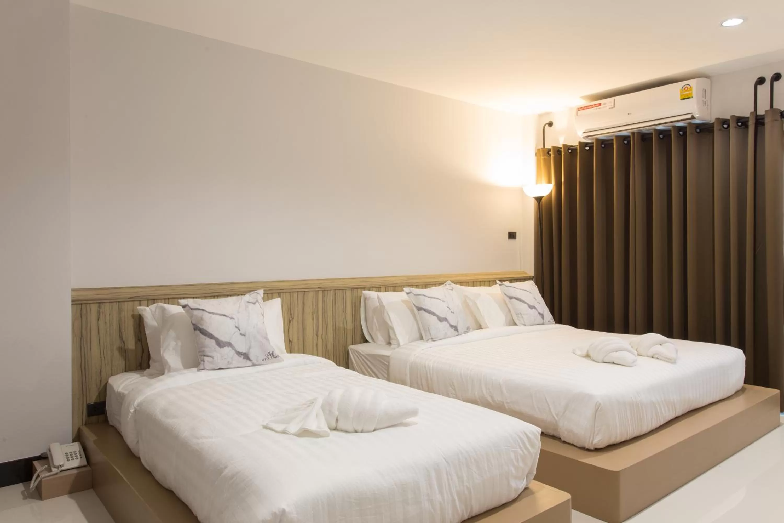 Photo of the whole room, Bed in Well Timed Hotel