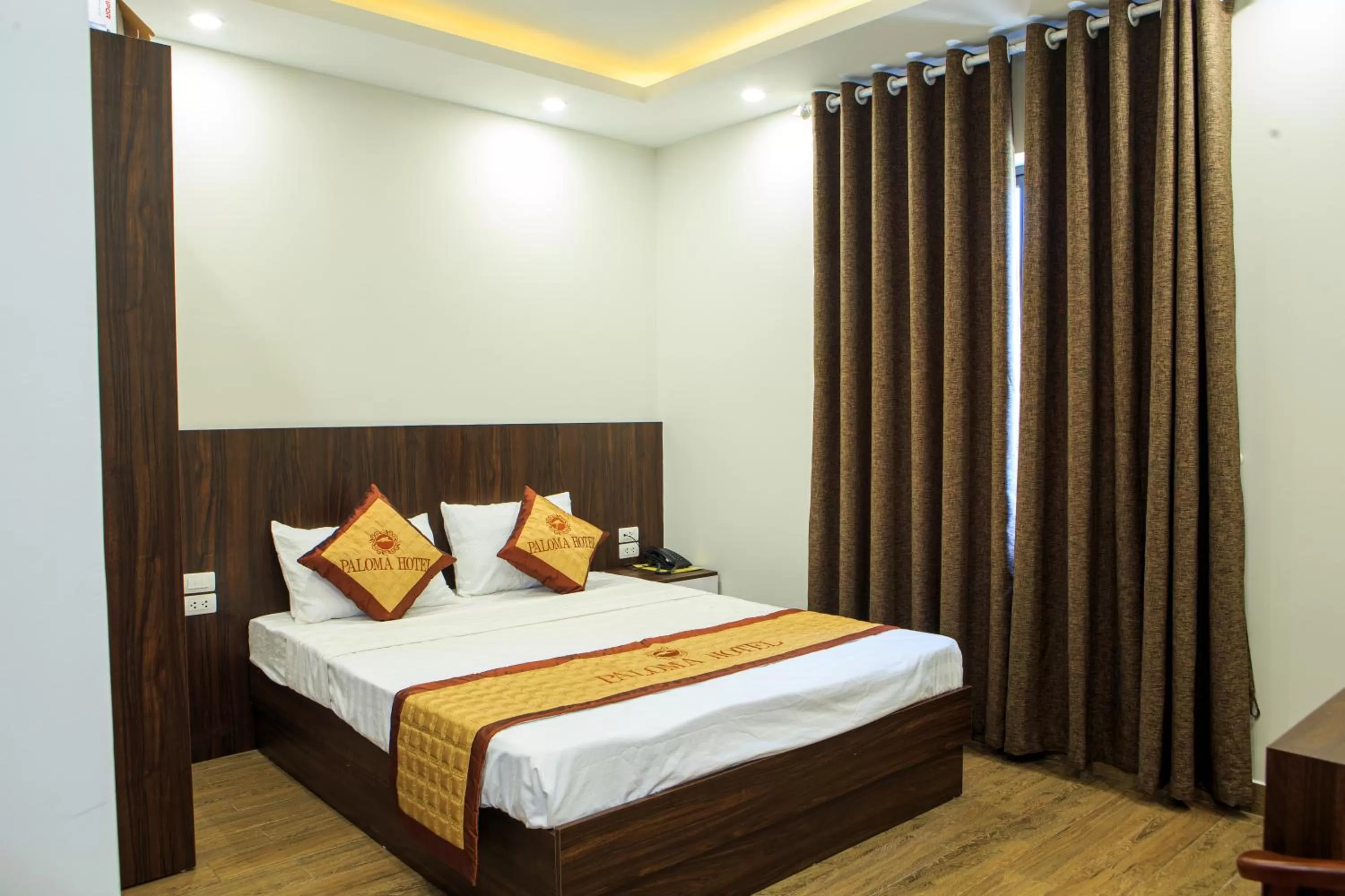 Bed in Paloma Hotel & Apartment