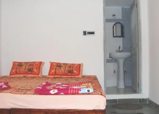 Bed in Udai Haveli Guest House